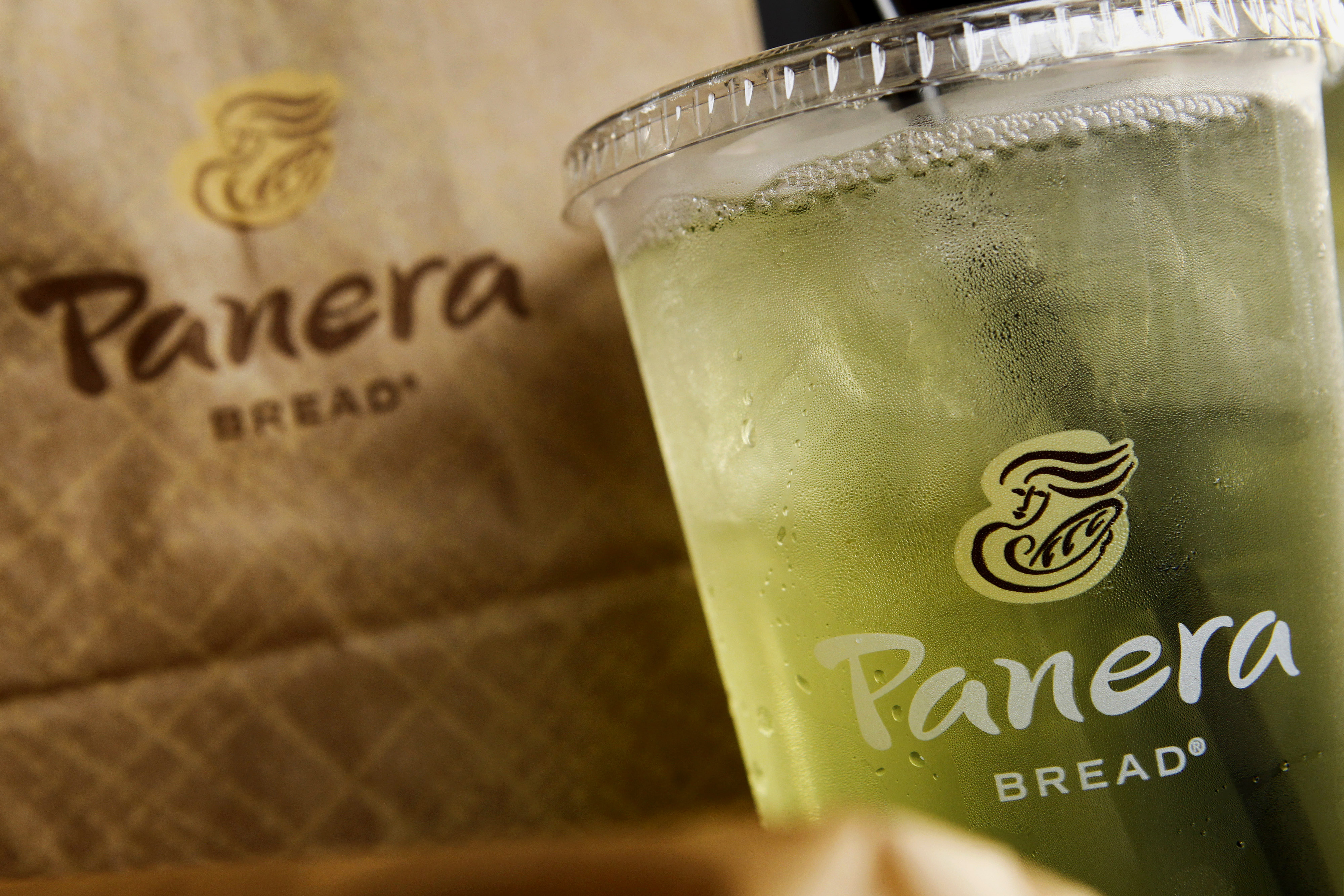 The Panera Bread Co. logo is seen on a cup of iced tea and a bag arranged for a photograph outside of a restaurant in Torrance, California, on Oct. 21, 2013. (Patrick T. Fallon—Bloomberg/Getty Images)