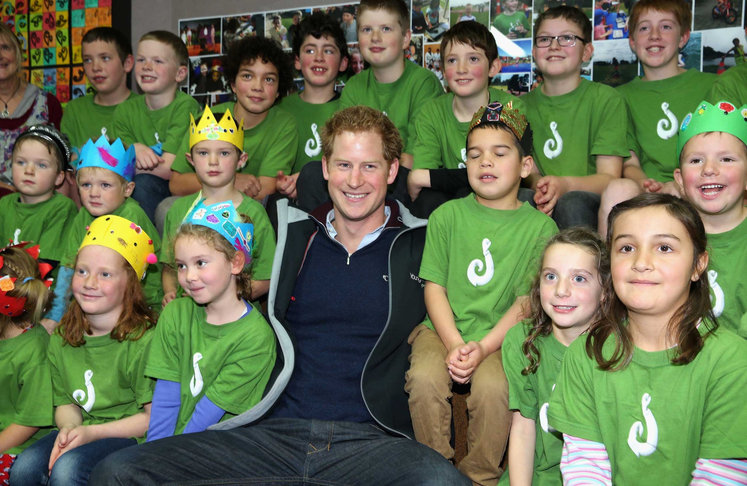 Prince Harry sits with pupils at Halfmoon Bay School in Oban, Stewart Island, New Zealand on May 11, 2015.