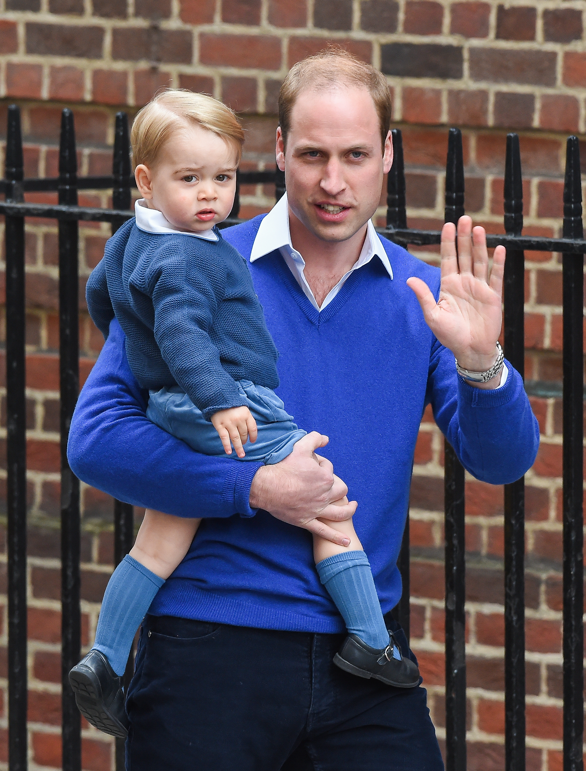 Prince William, Duke of Cambridge arrives with Prince George of Cambridge at the Lindo Wing following the birth his second child at St Mary's Hospital on May 2, 2015 in London. (Samir Hussein—WireImage/Getty Images)
