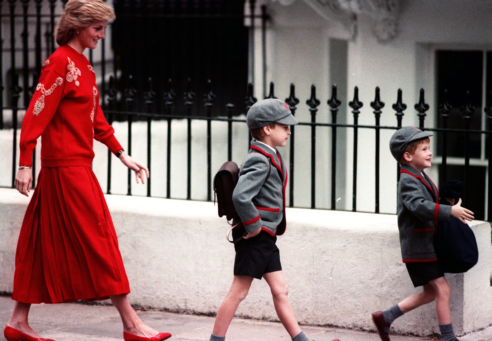File photo dated Sept. 15, 1989 of the Princess of Wales following her sons Prince Harry (right), five years old, and Prince William, seven, on Harry's first day at the Wetherby School in Notting Hill, West London.