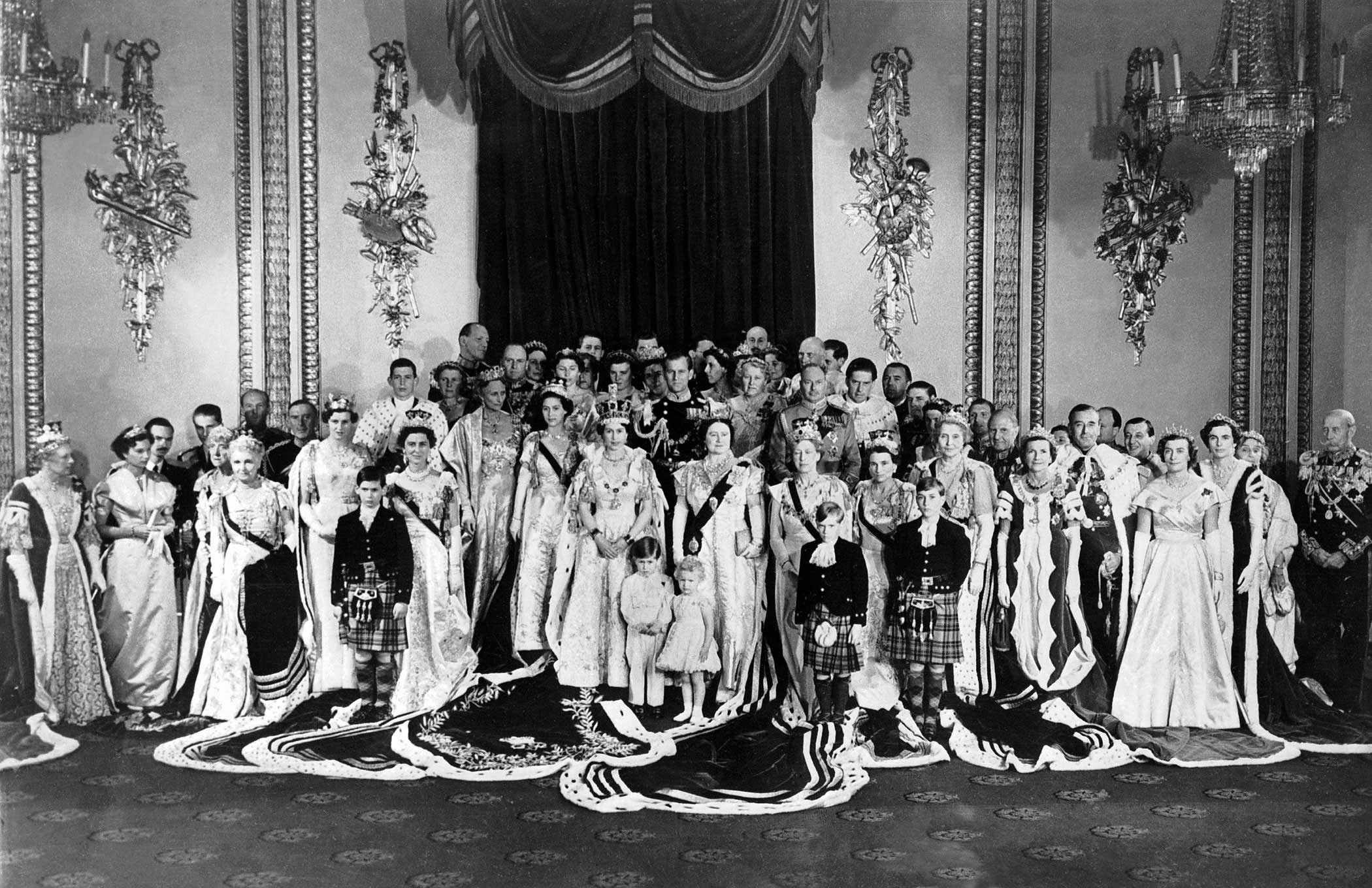 The royal family poses for a portrait on the day of the coronation, with Queen Elizabeth II in the center.
