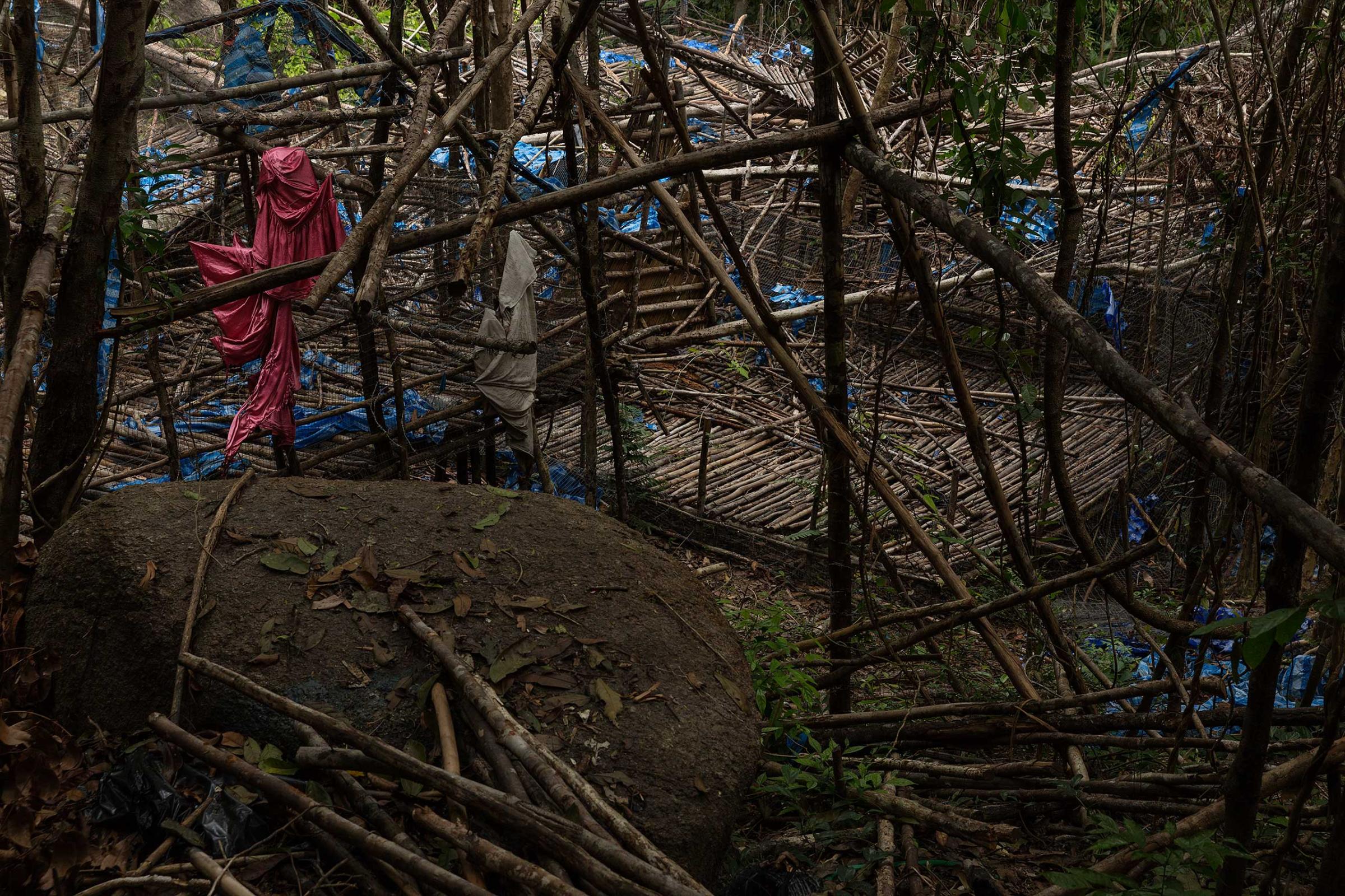 An abandoned camp allegedly for trafficked Rohingya and Bangladeshis in mountainous jungle on the Malaysian side of the Thai-Malaysian border.