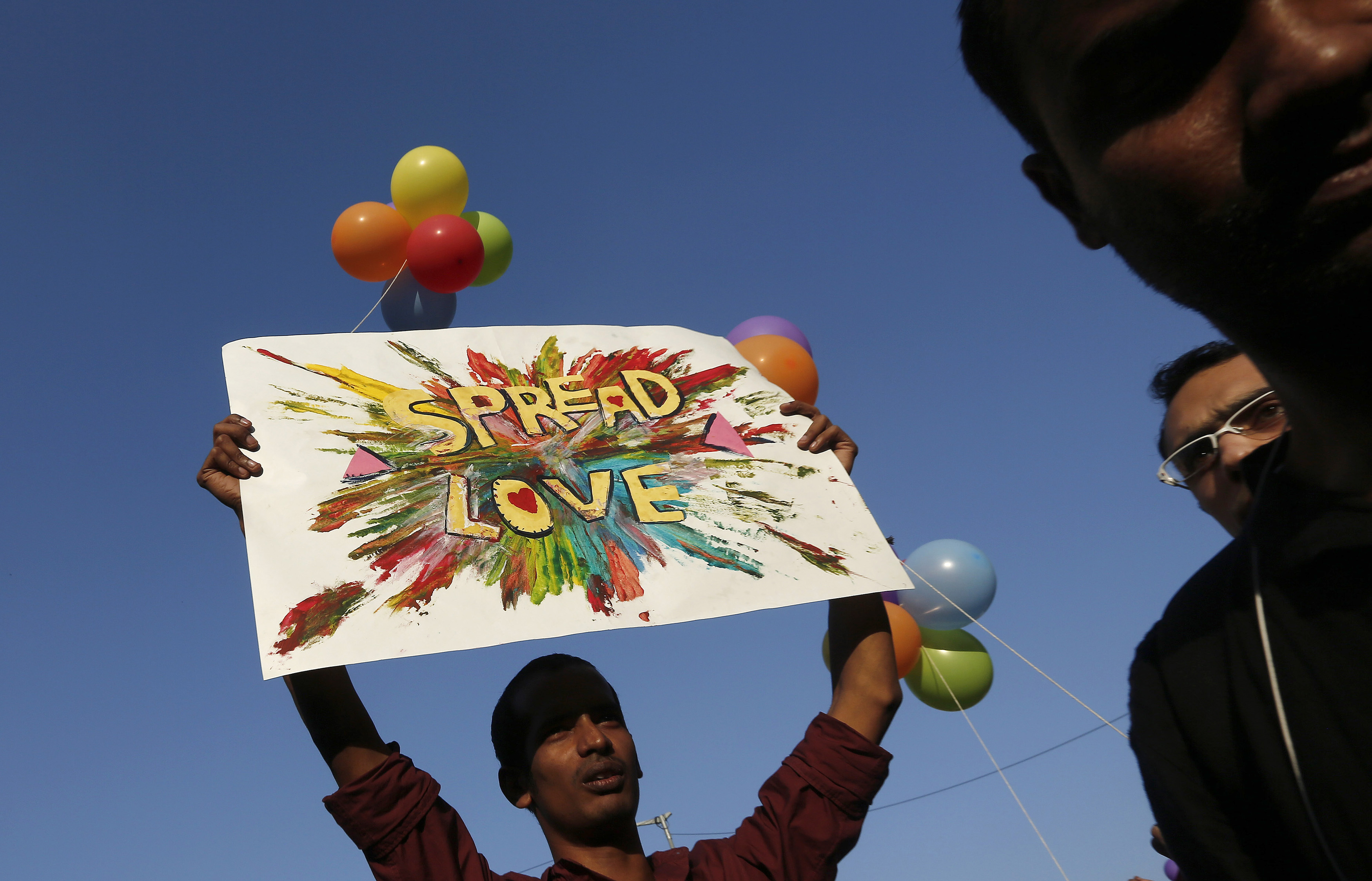 A participant holds a placard during Delhi Queer Pride Parade, an event promoting gay, lesbian, bisexual and transgender rights, in New Delhi on Nov. 30, 2014 (Adnan Abidi—Reuters)