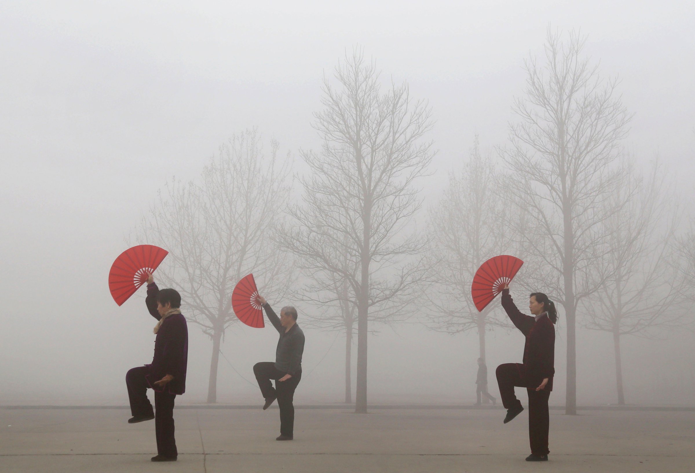 People do morning exercises on a polluted day in Jiaozuo