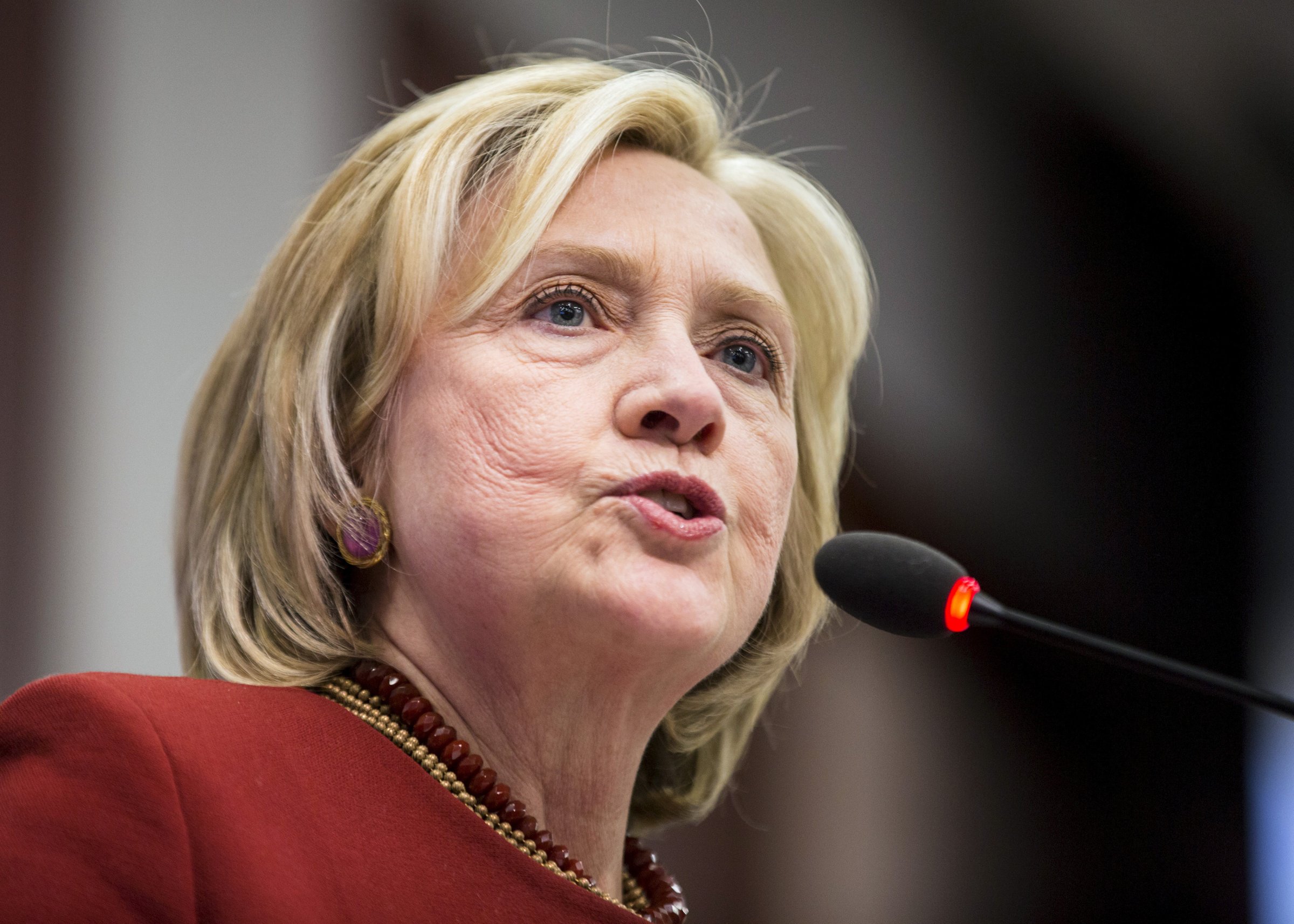 Hillary Clinton delivers remarks during the 2015 Toner Prize for Excellence in Political Reporting award in Washington