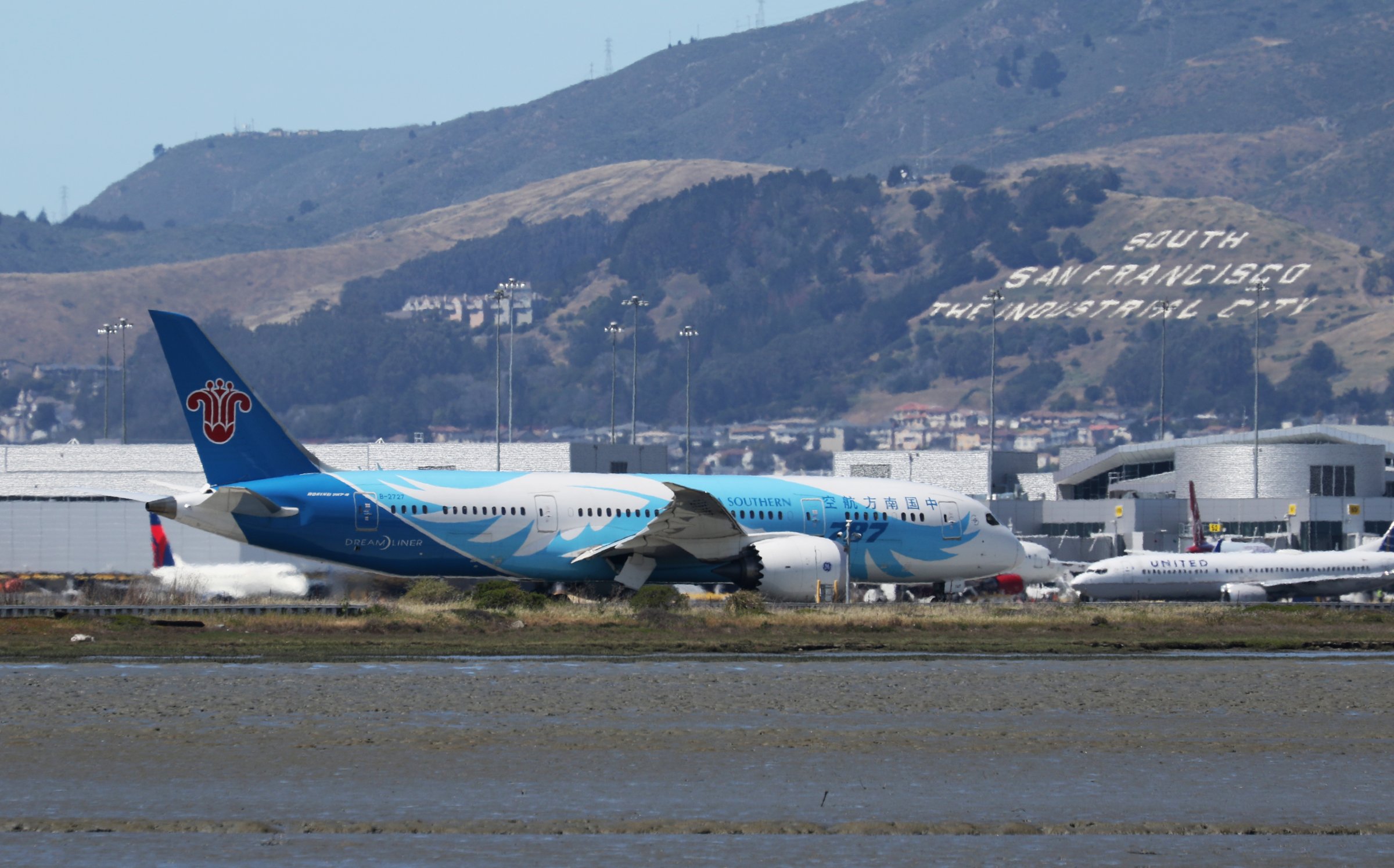 A China Southern Boeing 787, with Tail Number B-2727, taxis at San Francisco International Airport, San Francisco
