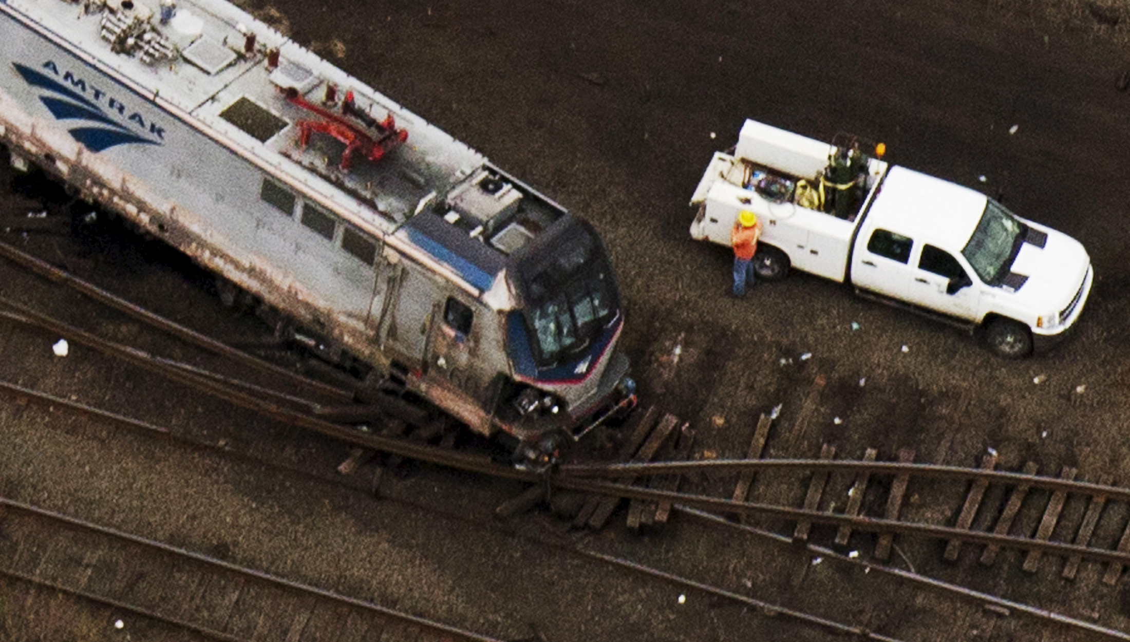 Emergency workers look through the remains of a derailed Amtrak train in Philadelphia, Pennsylvania in this May 13, 2015 file photo (Lucas Jackson—Reuters)