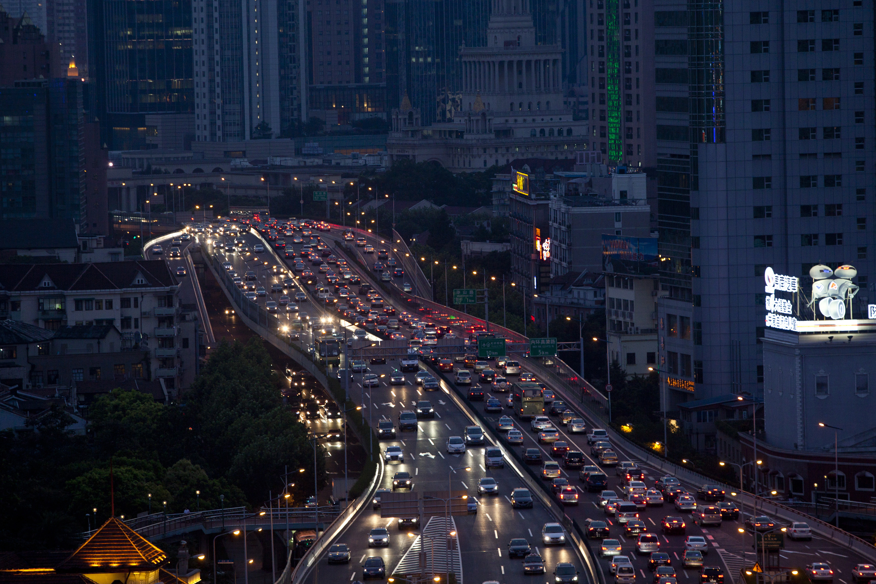 Lines of cars are pictured during a rush hour traffic jam in central Shanghai July 11, 2013.