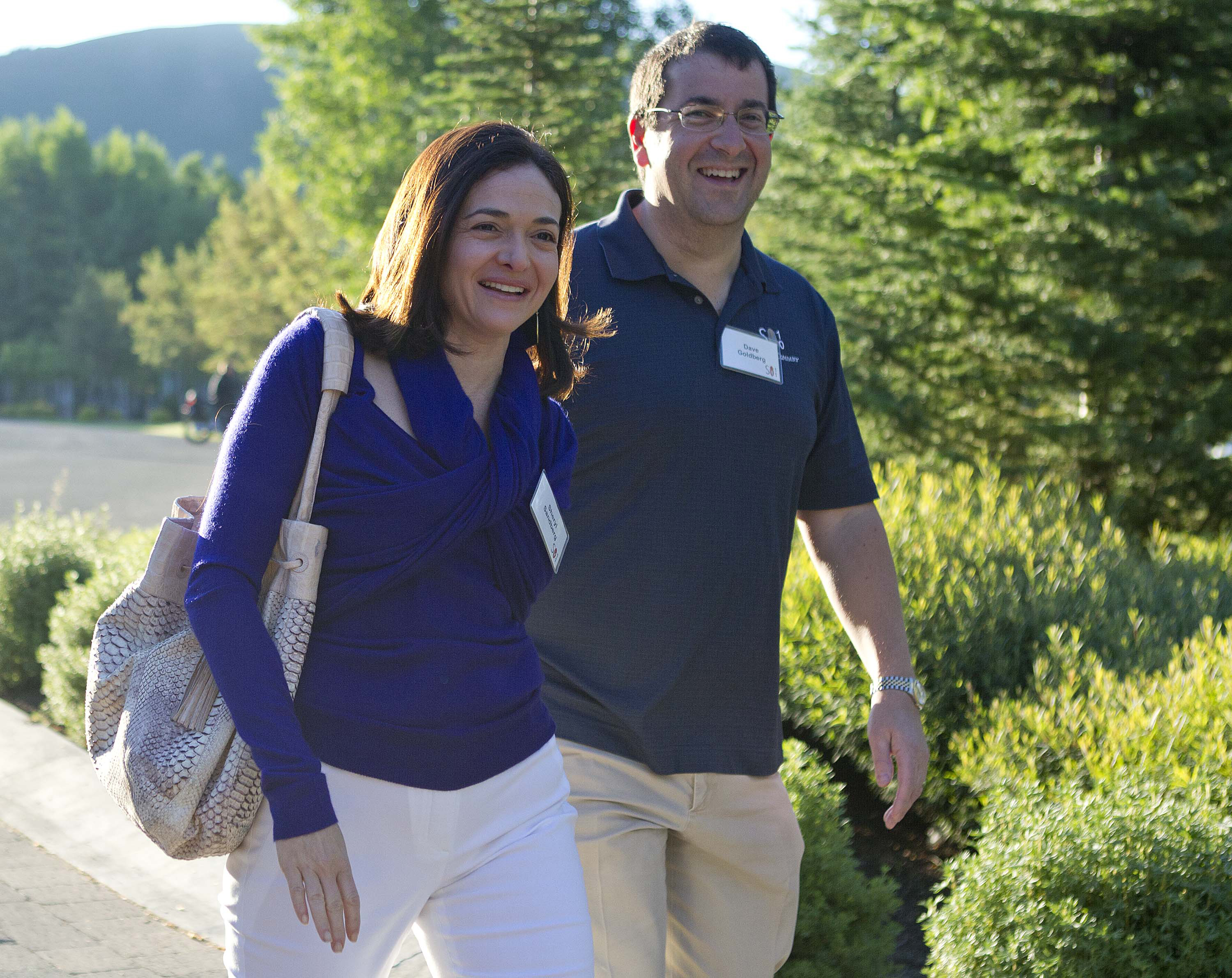 Facebook chief operating officer Sheryl Sandberg, left, and Dave Goldberg, CEO of Survey Monkey, arrive at the Sun Valley Inn for the 2011 Allen and Co. Sun Valley Conference, on July 6, 2011, in Sun Valley, Idaho. (Julie Jacobson—AP)