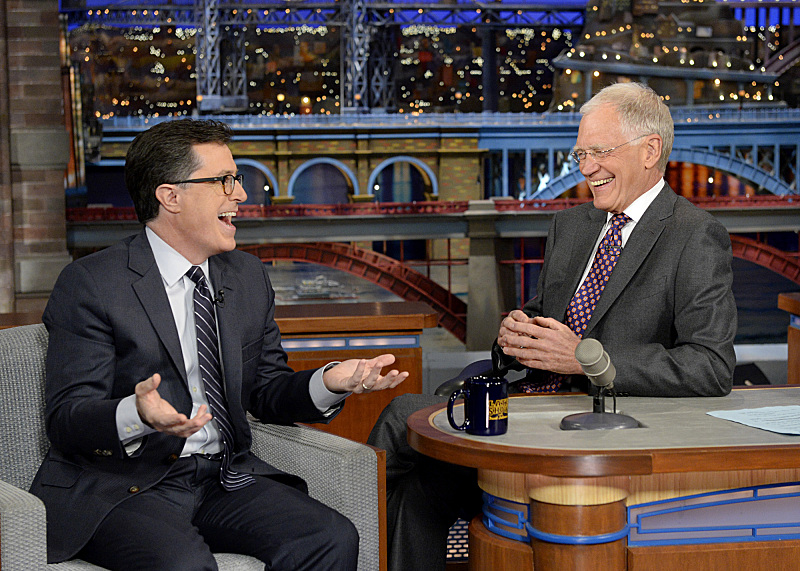 Colbert, with David Letterman on April 22. (John Paul Filo/CBS)