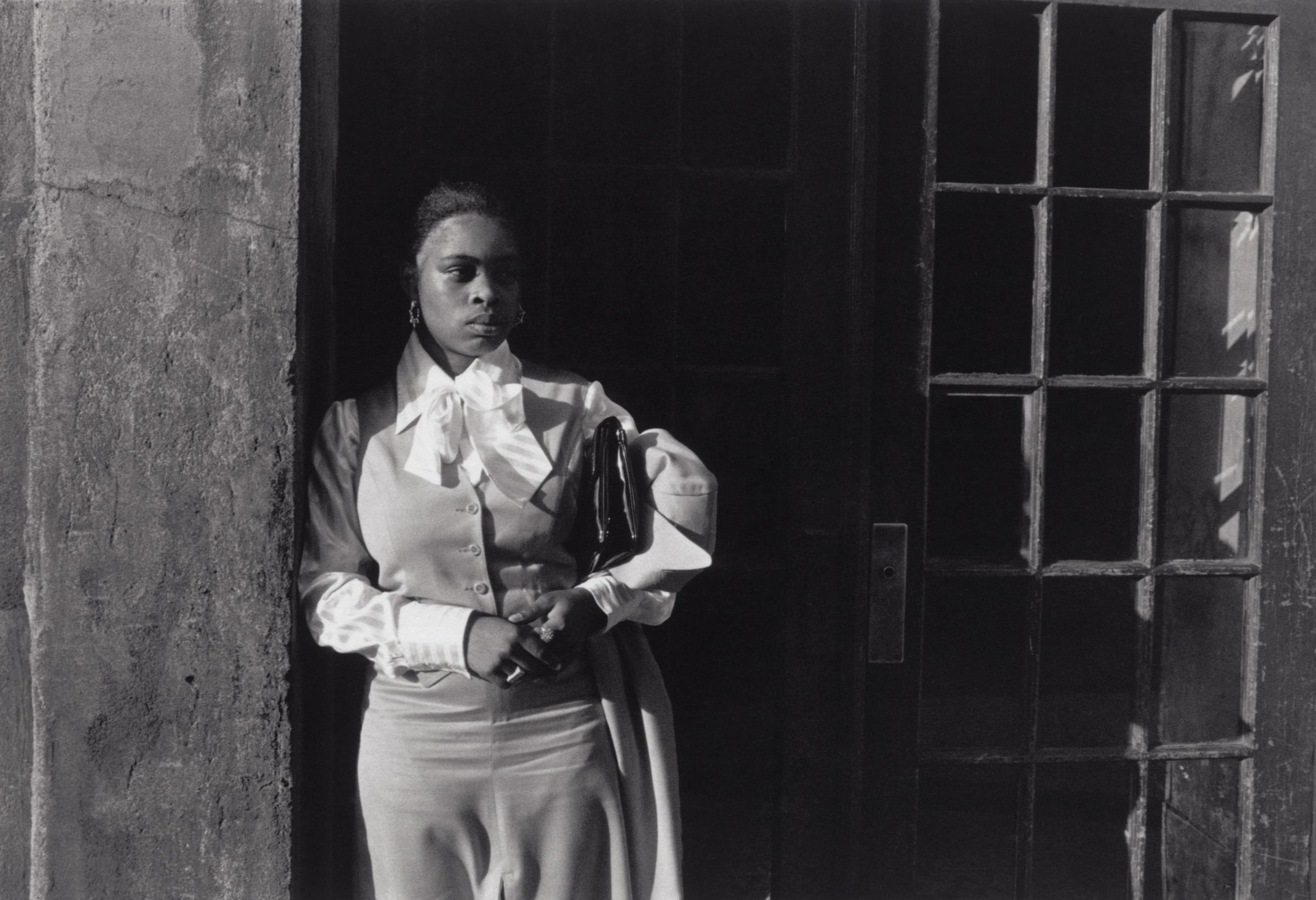 Harlem, U.S.A.: A Woman Waiting in a Doorway, 1976