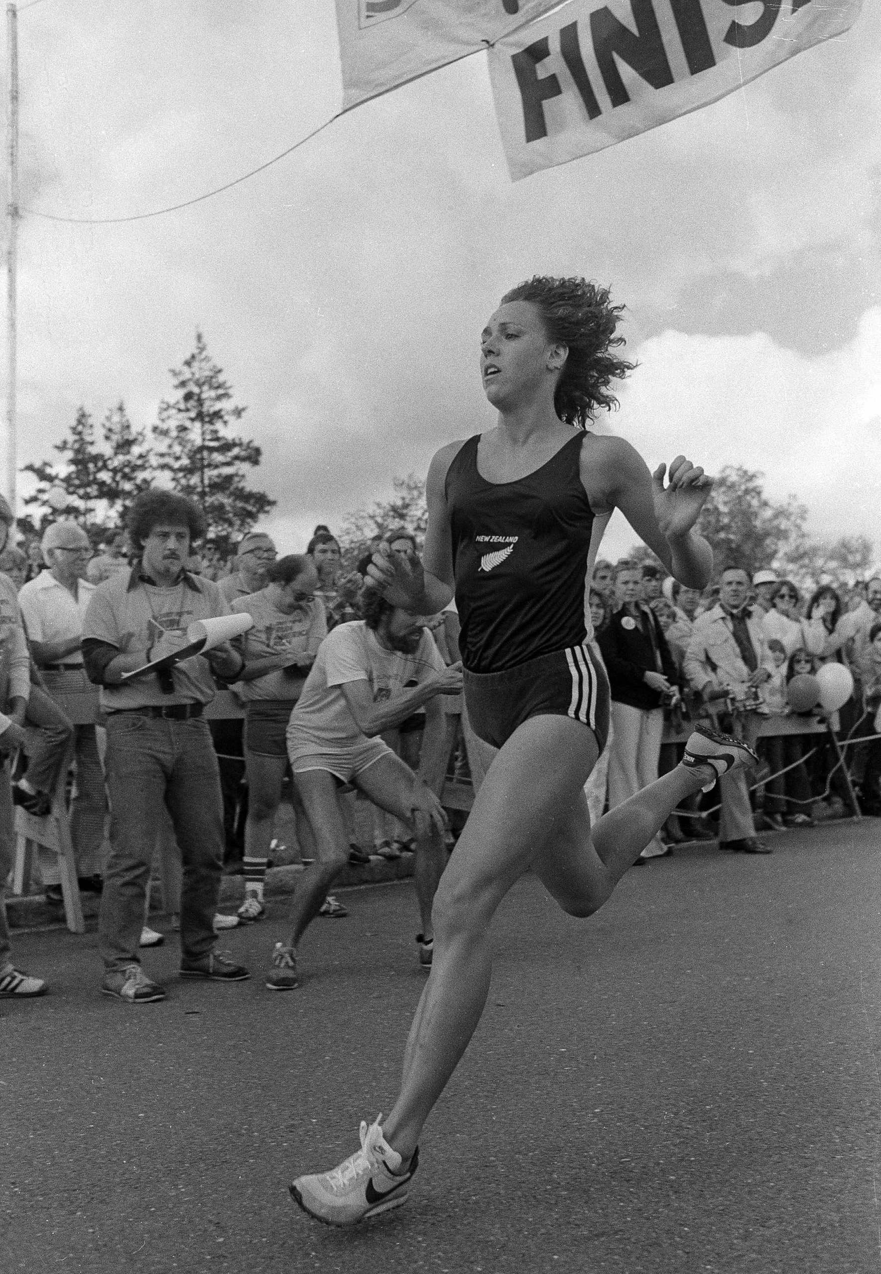 Mary Decker of Colorado University crosses the finish line of the National AAU 10,000-meter road racing championship in Purchase, N.Y., Sept. 23, 1978. Decker, would become the first woman to record a time under 4:20 for the mile, was the top woman finisher and 47th overall.