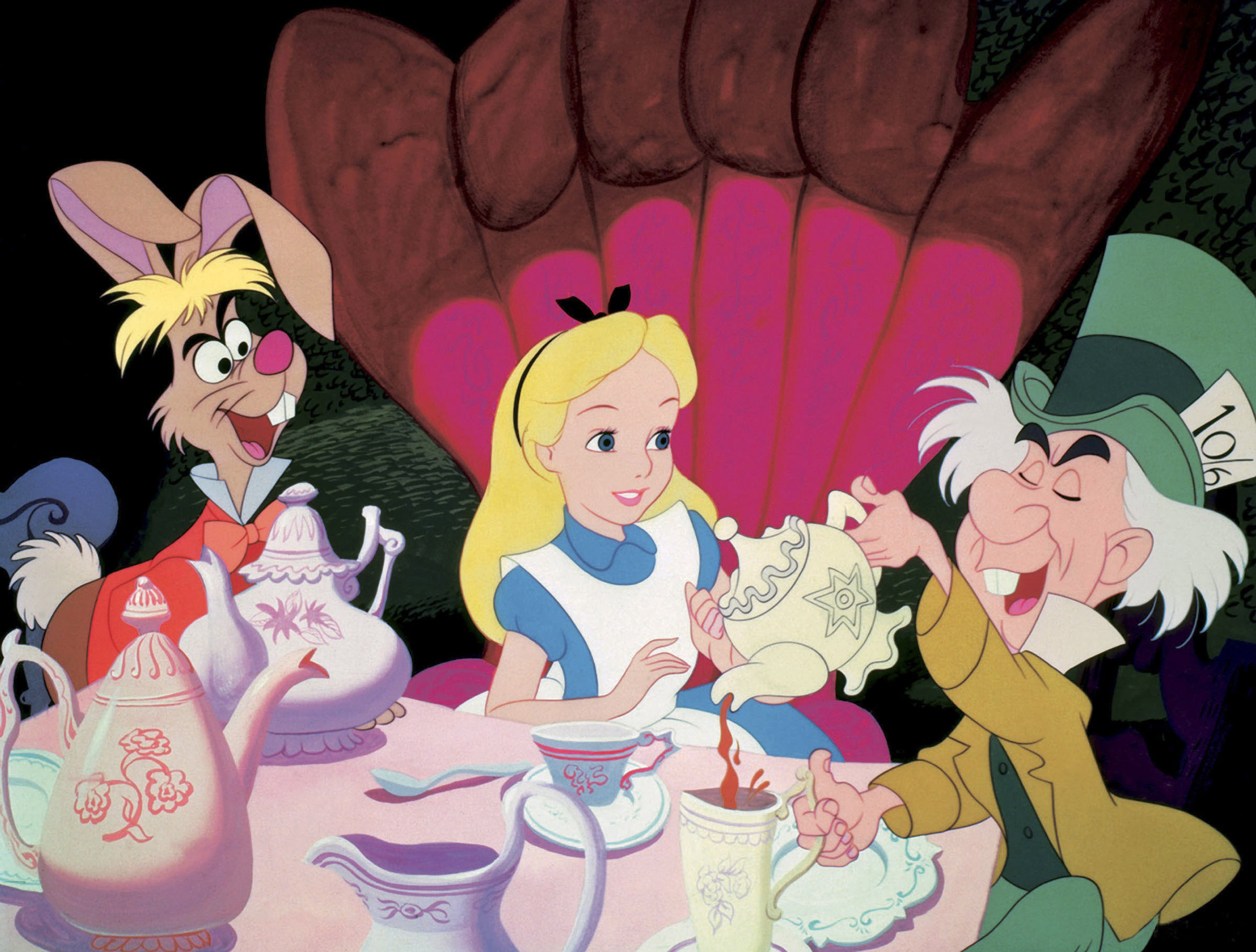 A scene from the Walt Disney film Alice in Wonderland with March Hare, Alice and the Mad Hatter, 1951.