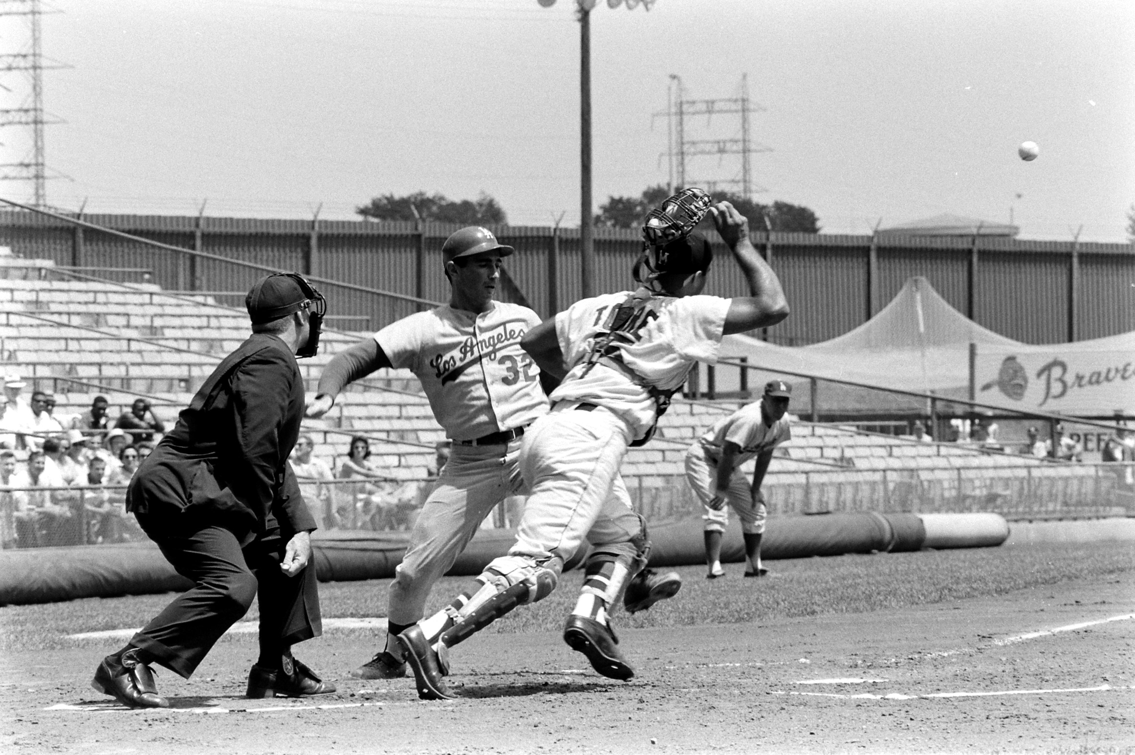 Los Angeles Dodgers pitcher Sandy Koufax in action during a game against the Milwaukee Braves, 1963.