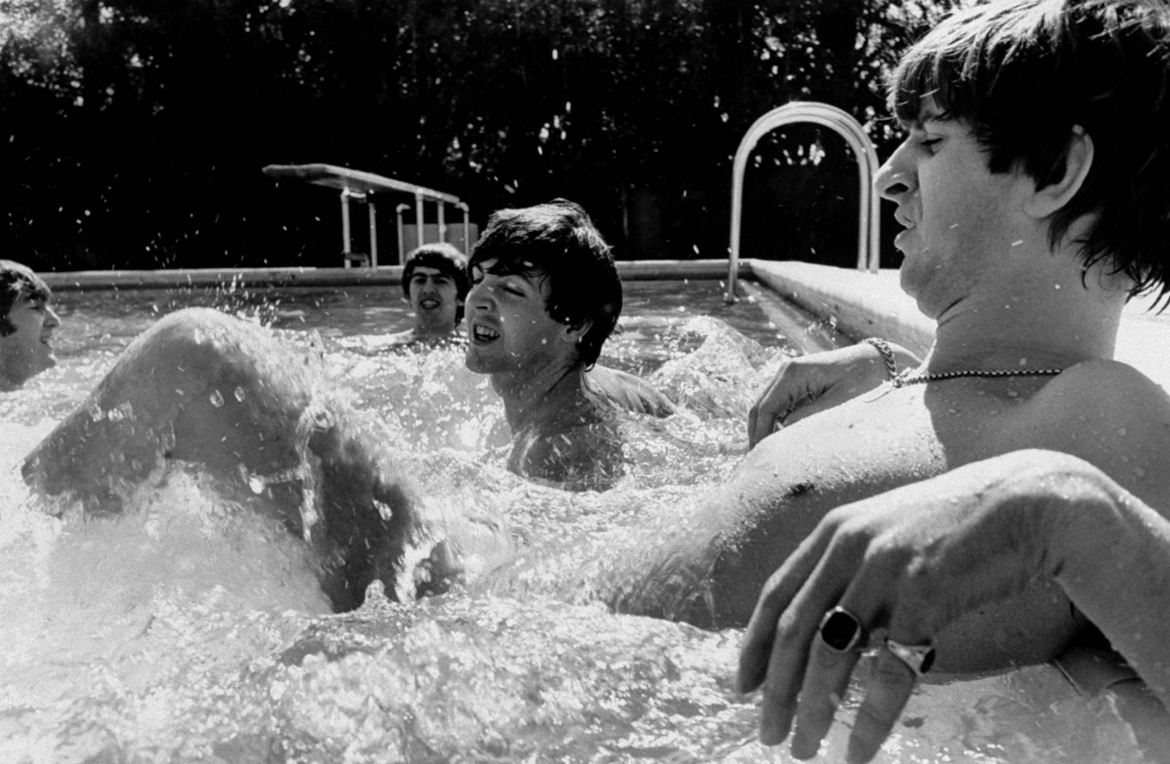 The Beatles in a pool in Miami 1964