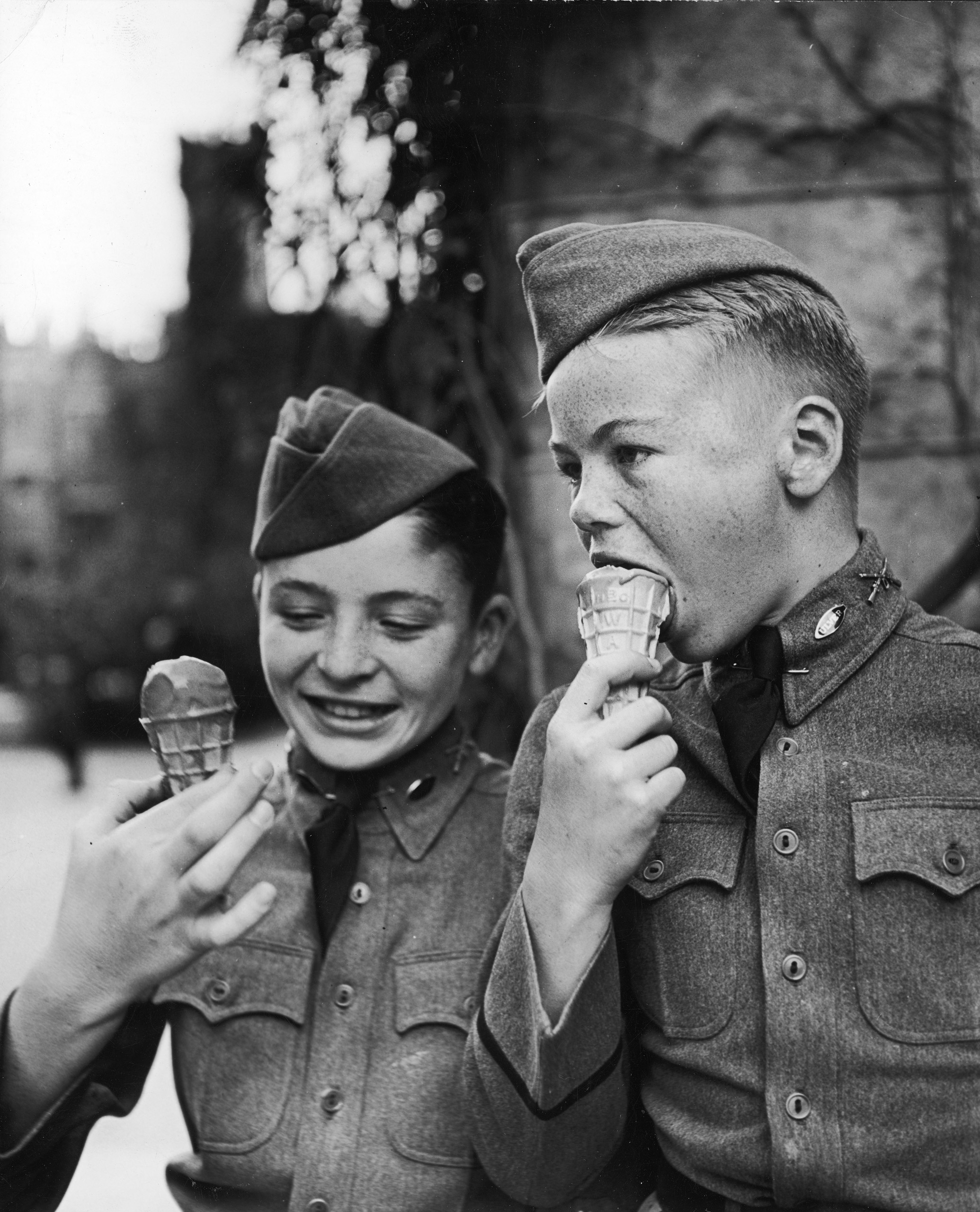 Two young boys eating ice cream, 1939.