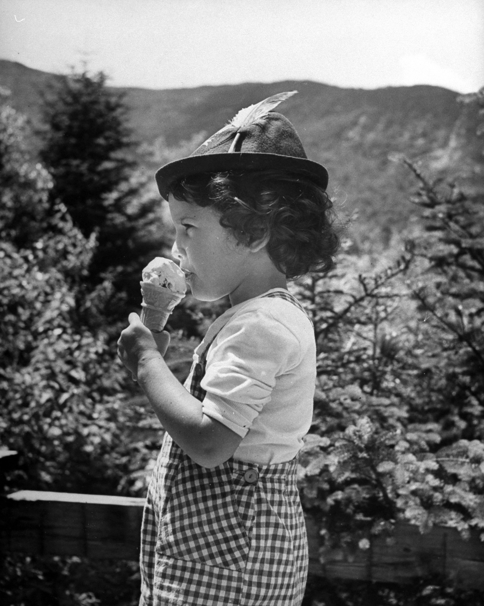 Young girl eating ice cream, 1946.