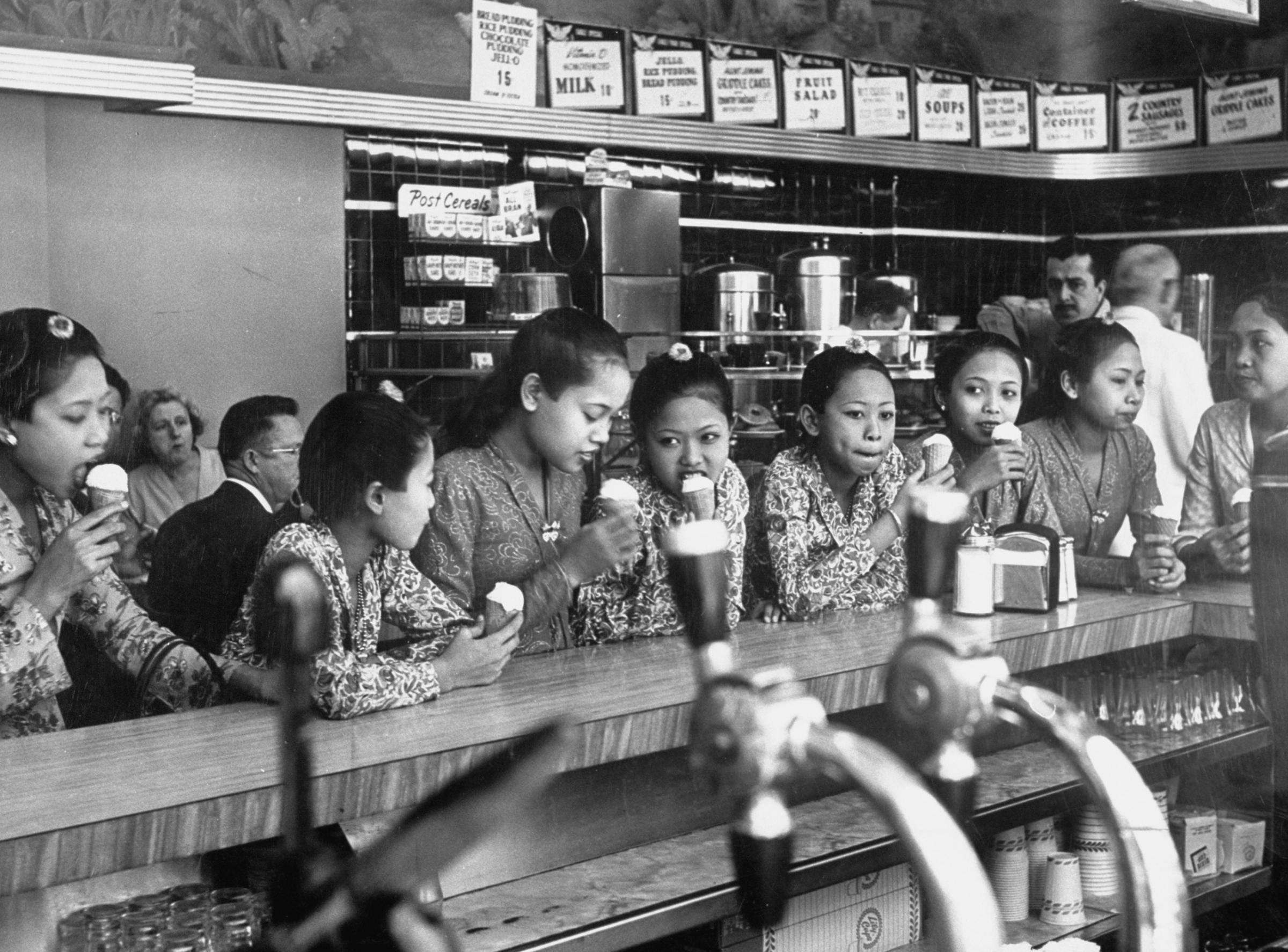 Balinese dancing girls eating ice cream, 1952.