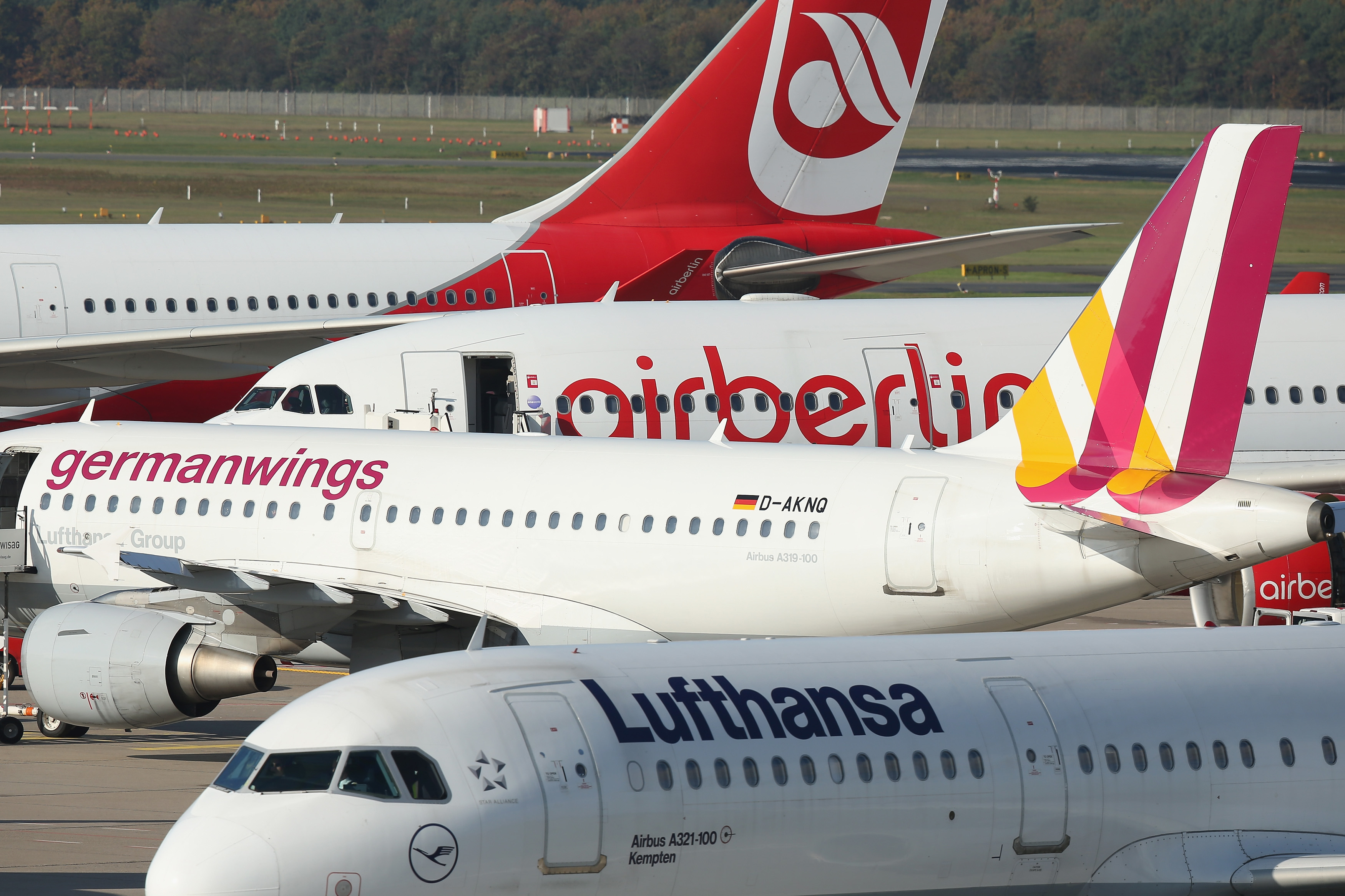 BERLIN, GERMANY - OCTOBER 21:  Passenger planes of Lufthansa, Germanwings and Air Berlin stand on the tarmac at Tegel Airport on October 21, 2014 in Berlin, Germany. The three are Germany's biggest three ailrines and Germanwings is a subsidiary of Lufthansa.  (Photo by Sean Gallup/Getty Images) (Sean Gallup&mdash;Getty Images)