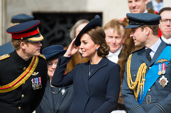 Prince Harry, Catherine, Duchess of Cambridge, and Prince William attend a commemoration for troops who were stationed in Afghanistan in London on March 13, 2015 (Samir Hussein—WireImage)