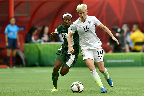 Megan Rapinoe #15 of the United States and Ngozi Okobi #13 of Nigeria during the Group D match of the FIFA Women's World Cup Canada 2015 in Vancouver on June 16, 2015.