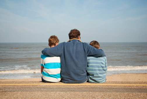 father-sons-beach