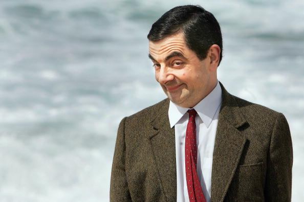 Rowan Atkinson in character as Mr. Bean arrives at Bondi Beach in Sydney to promote his film <i>Mr. Bean's Holiday</i>  on March 7, 2007 (Lisa Maree Williams—Getty Images)