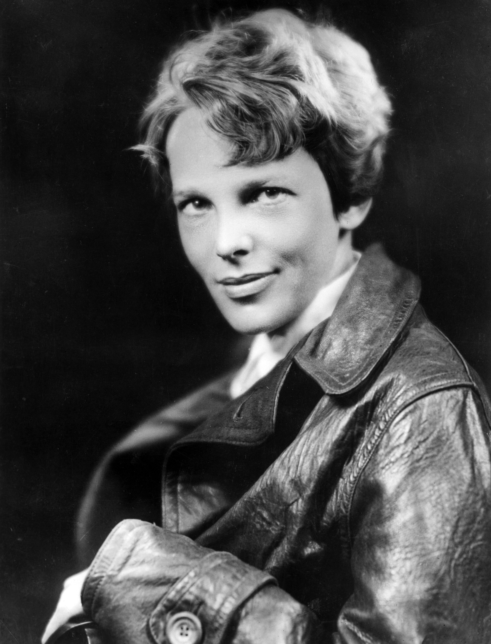 American aviator Amelia Earhart, the first woman to complete a solo transatlantic flight, wearing a leather jacket. Circa 1932.
