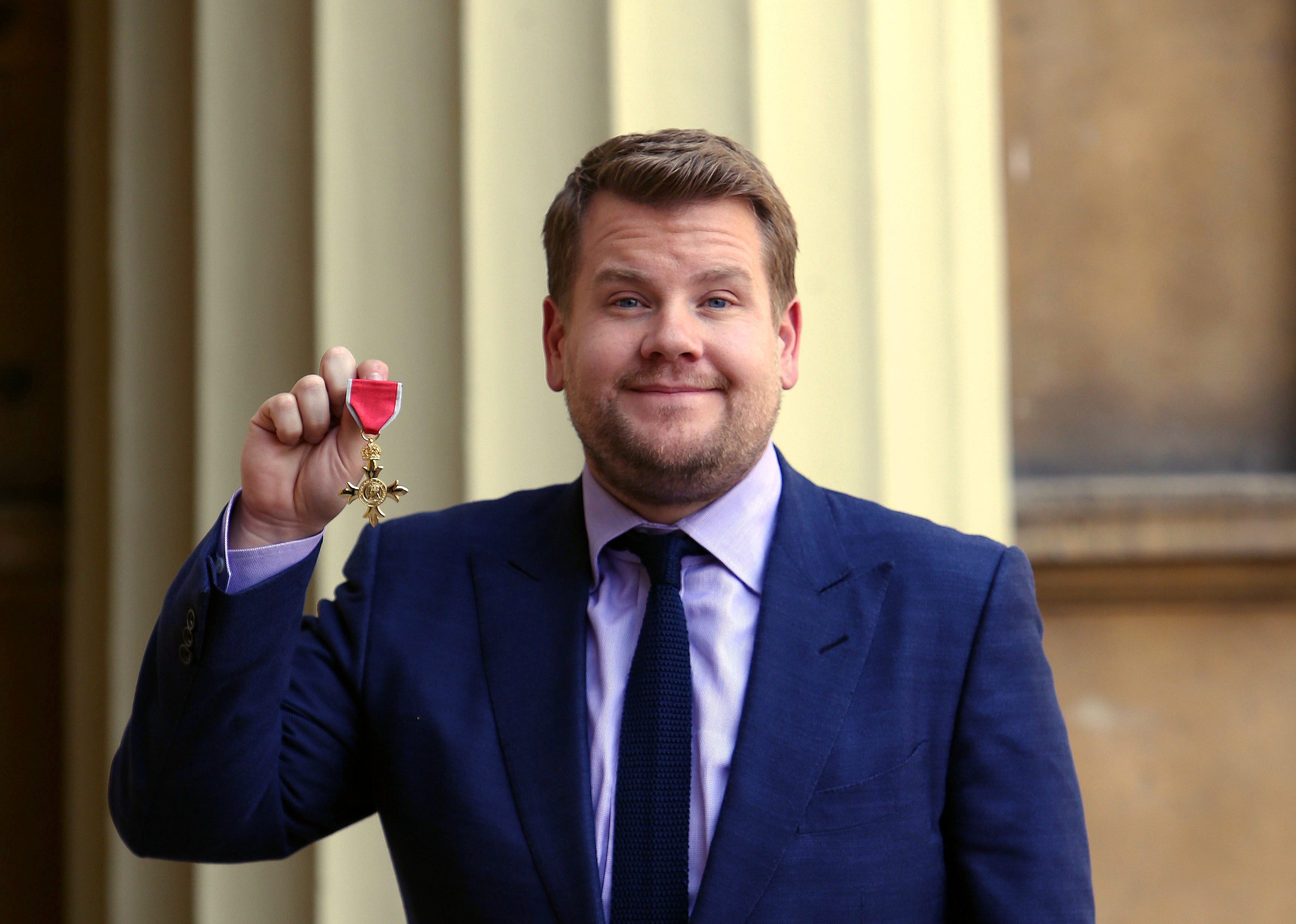 Investitures at Buckingham Palace. James Corden after being awarded an OBE by the Princess Royal at an investiture ceremony at Buckingham Palace, London. Picture date: Thursday June 25, 2015 (Steve Parsons—PA Wire/Press Association Images)