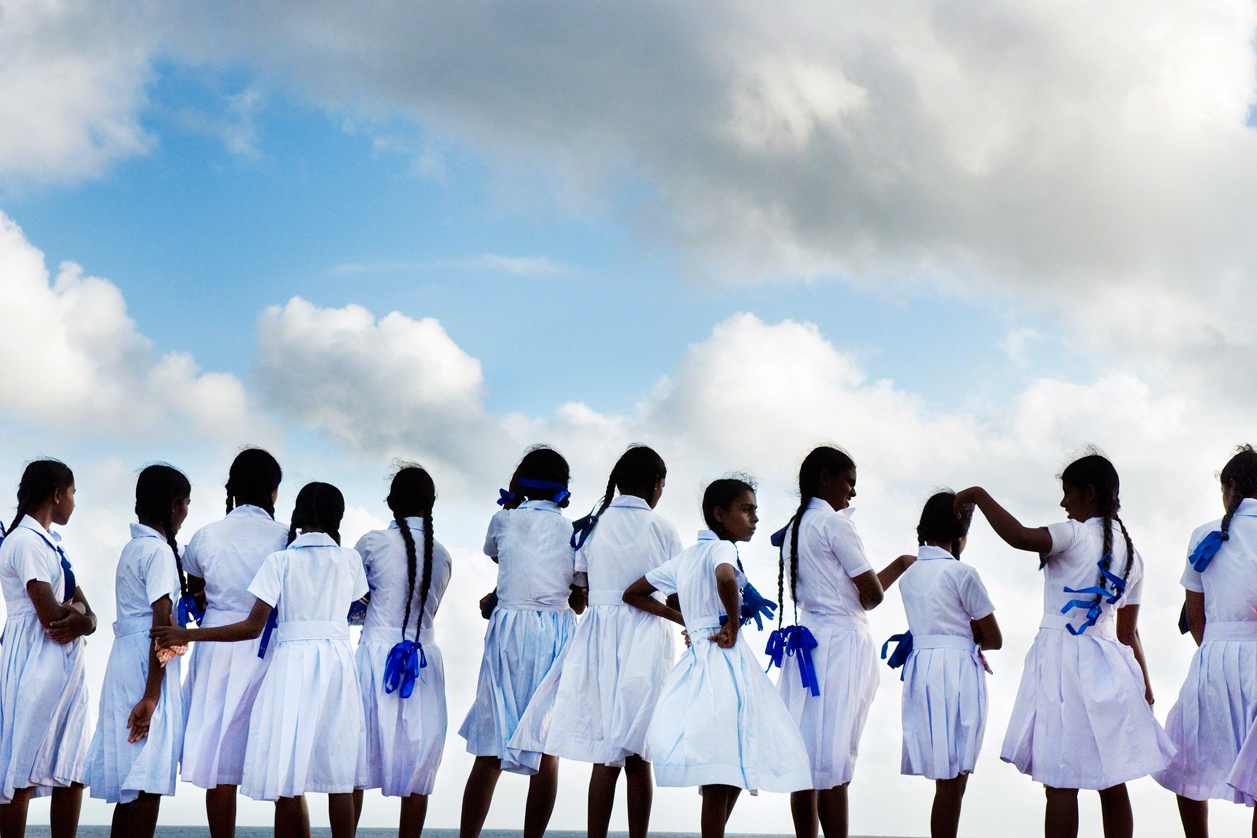School girls look out to sea in Galle Port, Sri Lanka, 2007.
