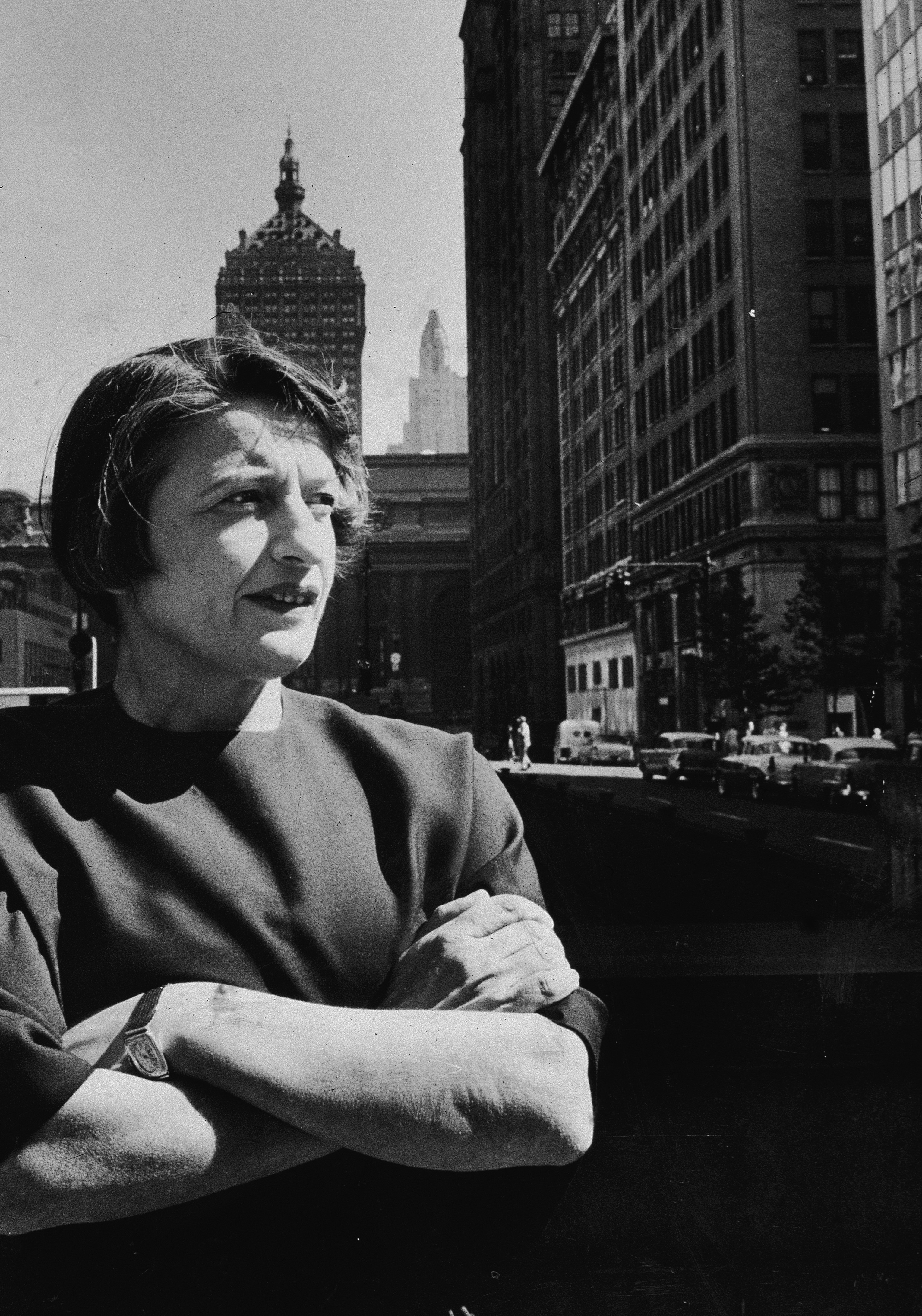 Russian-born author and philosopher Ayn Rand (1905 - 1982) stands with her arms folded on a street in New York City in 1957.