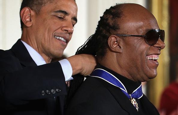 U.S. President Barack Obama (L) presents the Presidential Medal of Freedom to singer songwriter Stevie Wonder  (R) during an East Room ceremony at the White House November 24, 2014 in Washington, DC. (Alex Wong—Getty Images)