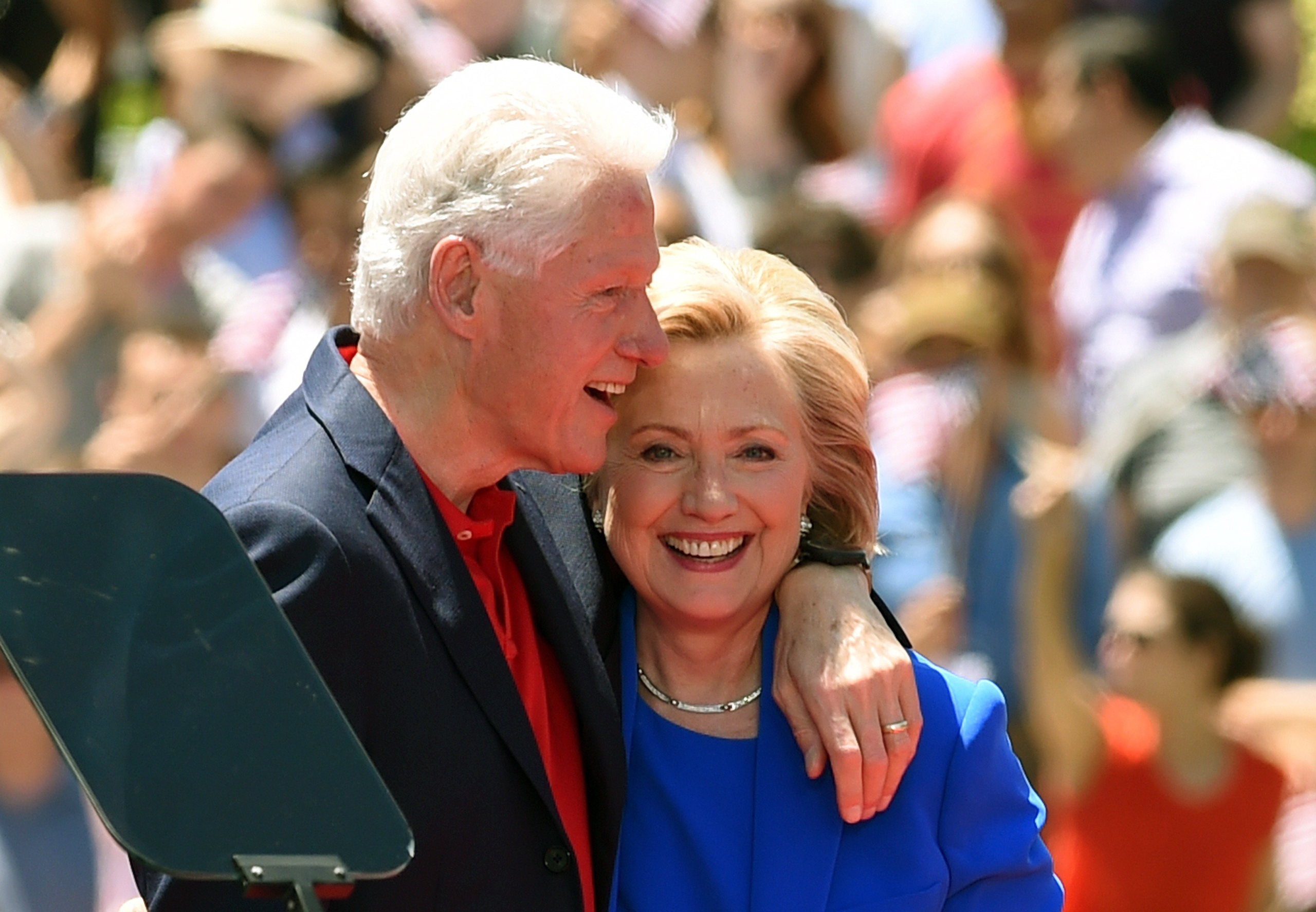 Former Secretary of State Hillary Clinton and Former US President Bill Clinton hug after she officially launched her campaign for the Democratic presidential nomination during a speech at the Franklin D. Roosevelt Four Freedoms Park on Roosevelt Island in New York, June 13, 2015 . (Timothy A. Clary — AFP/Getty Images)