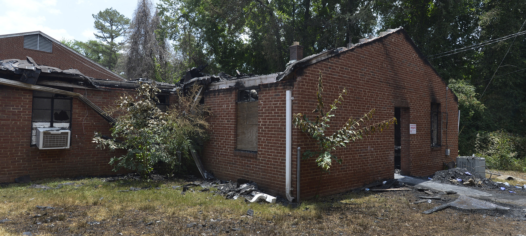This June 24, 2015 photo shows the charred remains of the back left wing of Briar Creek Road Baptist Church in Charlotte, N.C. (Davie Hinshaw—AP)