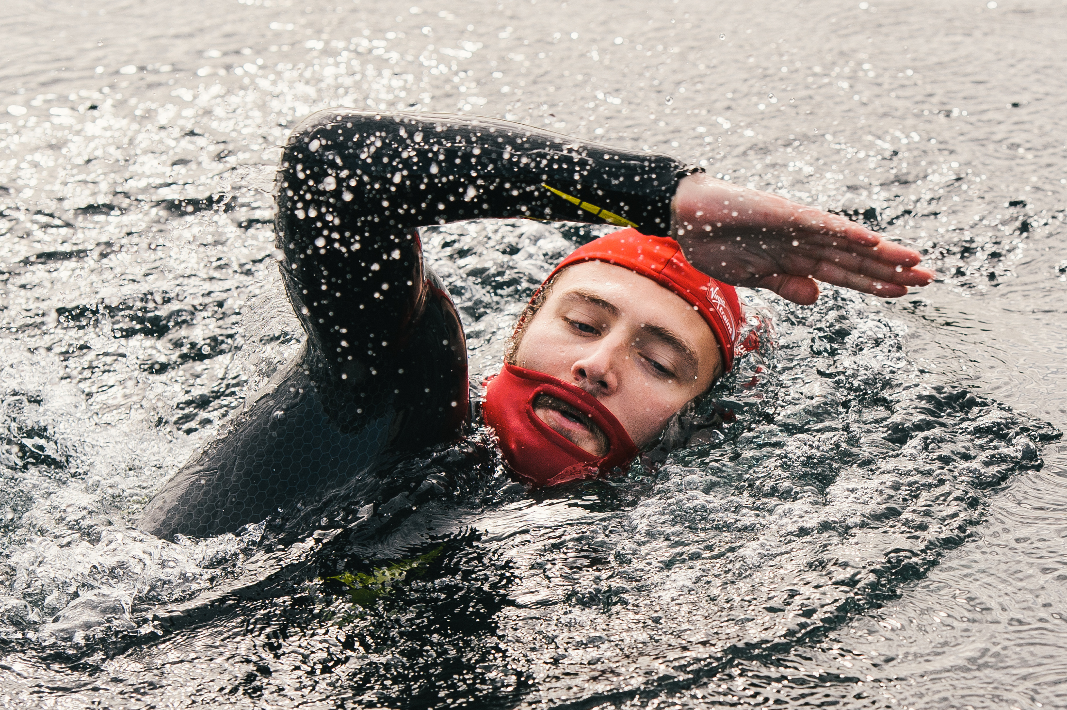 Virgin Trains, official train partner to the Great North Swim, has launched an innovative swim cap for bearded men – the Beard Cap - which will be trialled with customers competing at the Great North Swim, Lake Windermere, June 12 – 14, 2015. Responding to debates on swimming forums about big beards causing drag, Virgin Trains commissioned its own research which revealed that over one in ten men (12 per cent) connected their beard to slower swim times, and nearly a quarter of men feel their beards hinder their sports performance. For swimmers, spectators and supporters planning a weekend away to the Lakes during the Great North Swim, there are exclusive discounts of up to 50%  across Virgin Trains First and Standard Advance Fares. To find out more information and buy tickets to travel to The Great North Swim visit http://www.virgintrains.co.uk/nova/