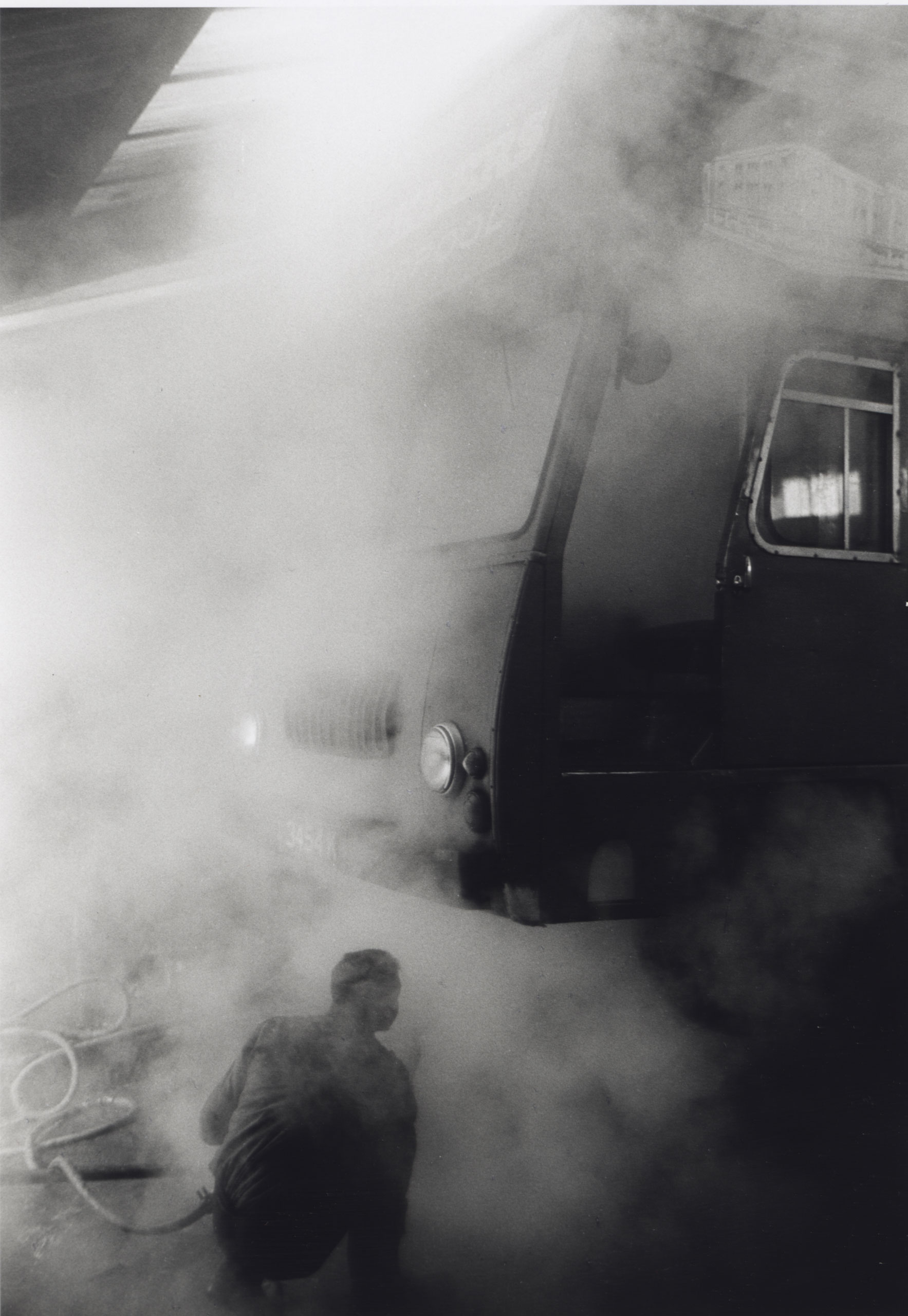 Man Under Autobus, Liverpool, England, 1964