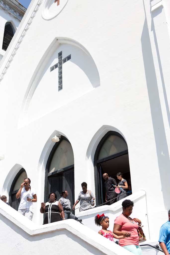 Worshippers leave Sunday service at Mother Emanuel AME Church in Charleston, S.C. on June 21 2015.