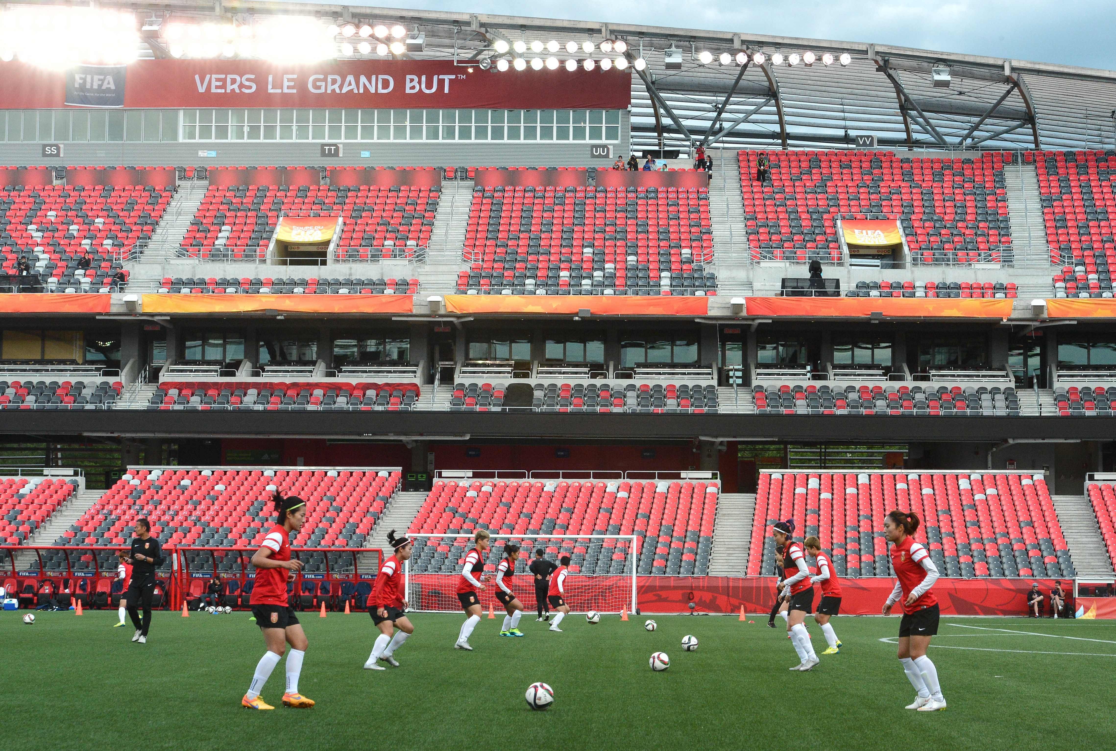 Members of China's national team take part in a training session at Lansdowne Stadium in Ottawa on June 25, 2015 on the eve of their 2015 FIFA Women's World Cup quarterfinal match against the US.