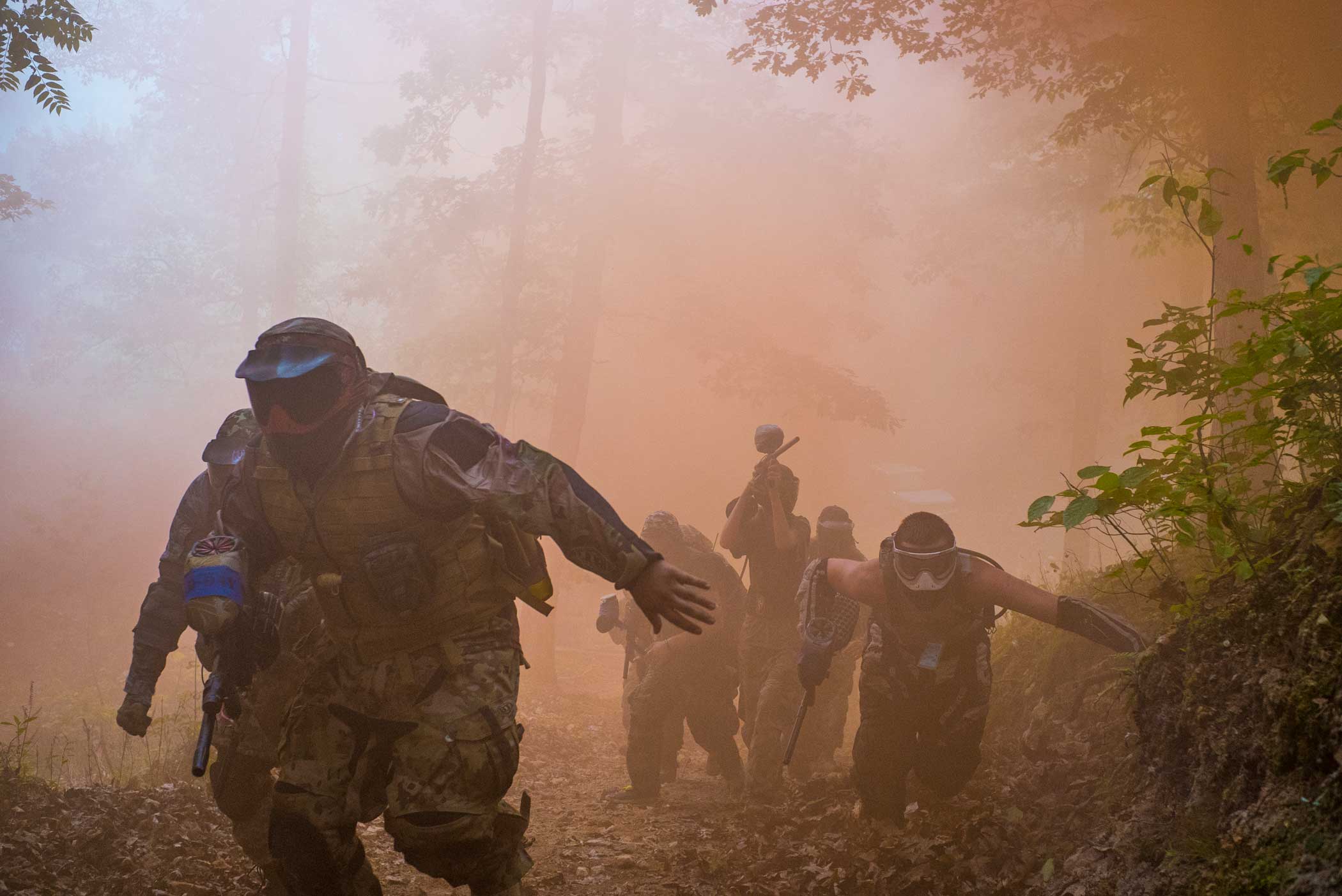 1st Infantry Division paintballers charge uphill during the assault on  Omaha Beach.