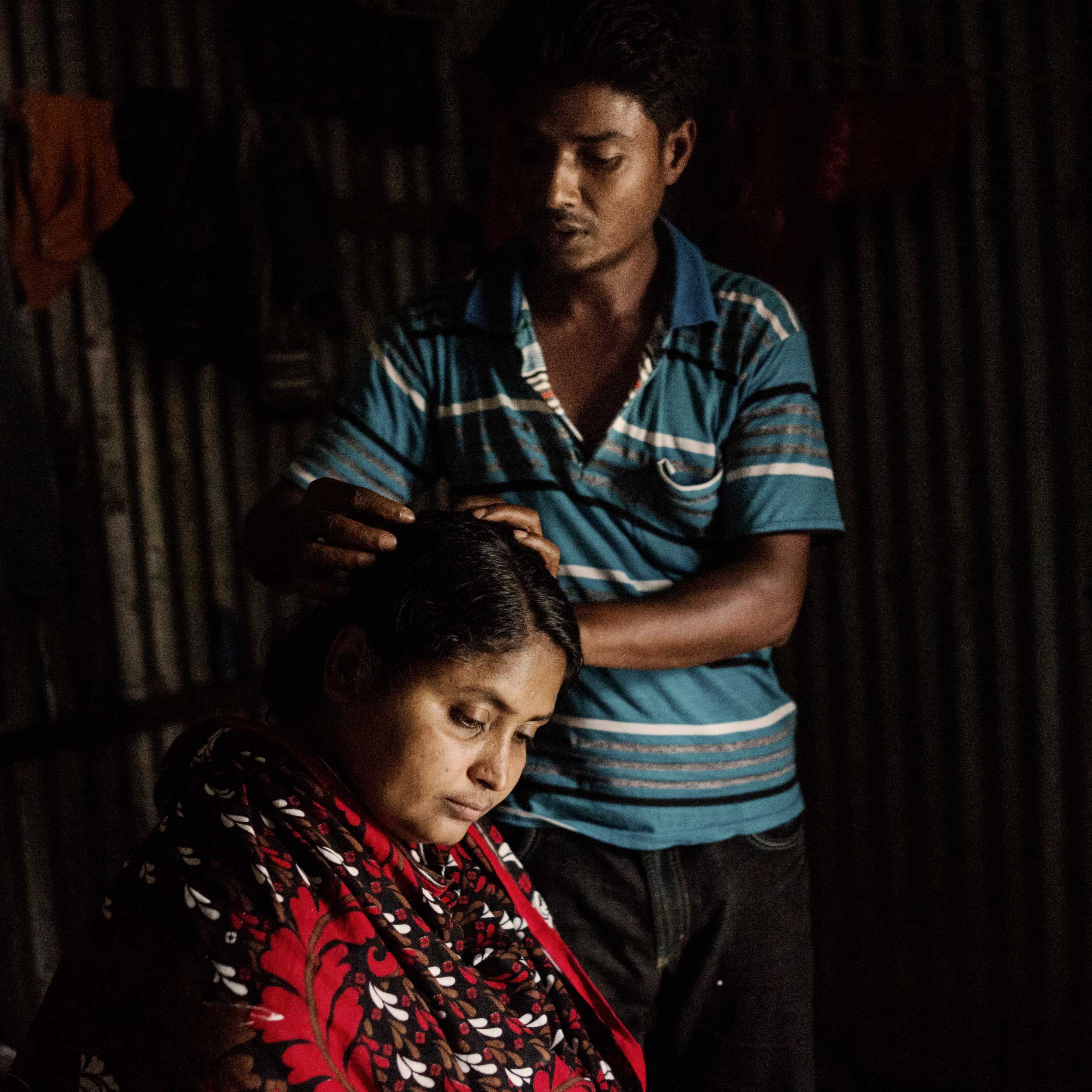 Mominul Islam and his wife Sharvanu, who was seriously injured in the collapse of the Rana Plaza garment factory. (Ismail Ferdous)