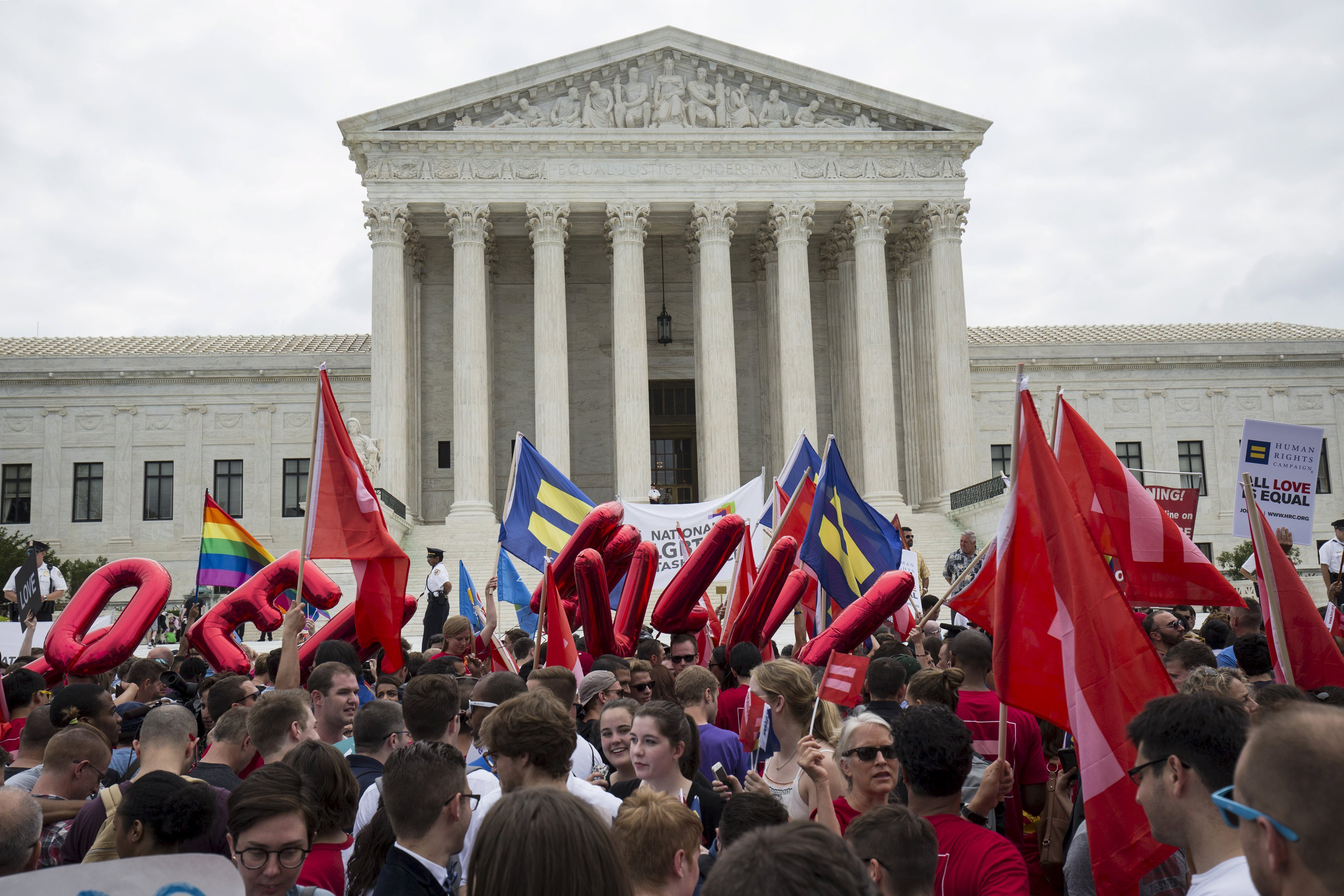 Supporters of gay marriage rally after the U.S. Supreme Court ruled on Friday that the U.S. Constitution provides same-sex couples the right to marry at the Supreme Court in Washington June 26, 2015. (Joshua Roberts—Reuters)