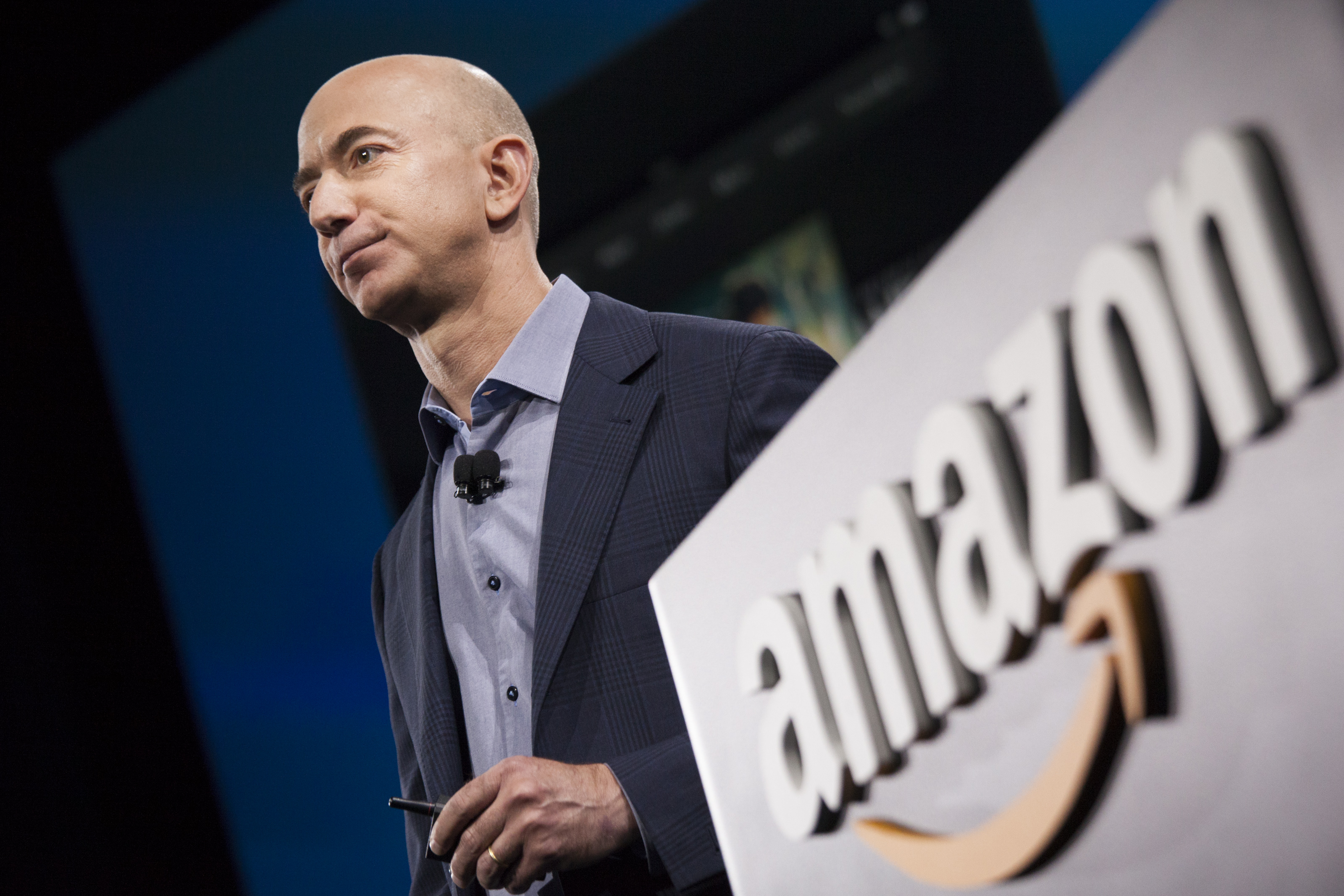 Amazon.com founder and CEO Jeff Bezos presents the company's first smartphone, the Fire Phone, in Seattle, on June 18, 2014. (David Ryder—Getty Images)