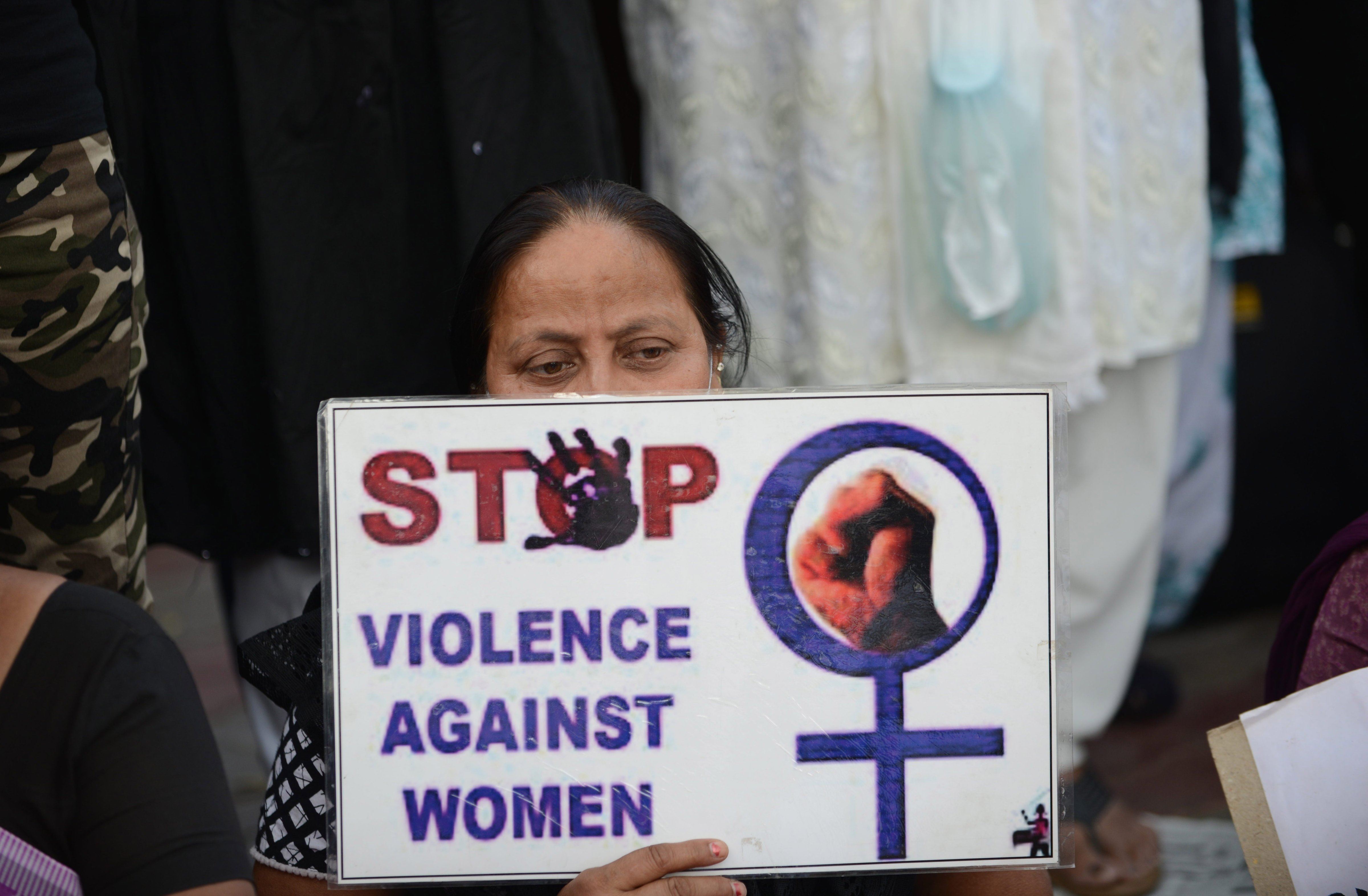A woman attends a peace protest in Ahmedabad on March 20, 2015, in the wake of the gang-rape on an elderly nun. (SAM PANTHAKY—AFP/Getty Images)