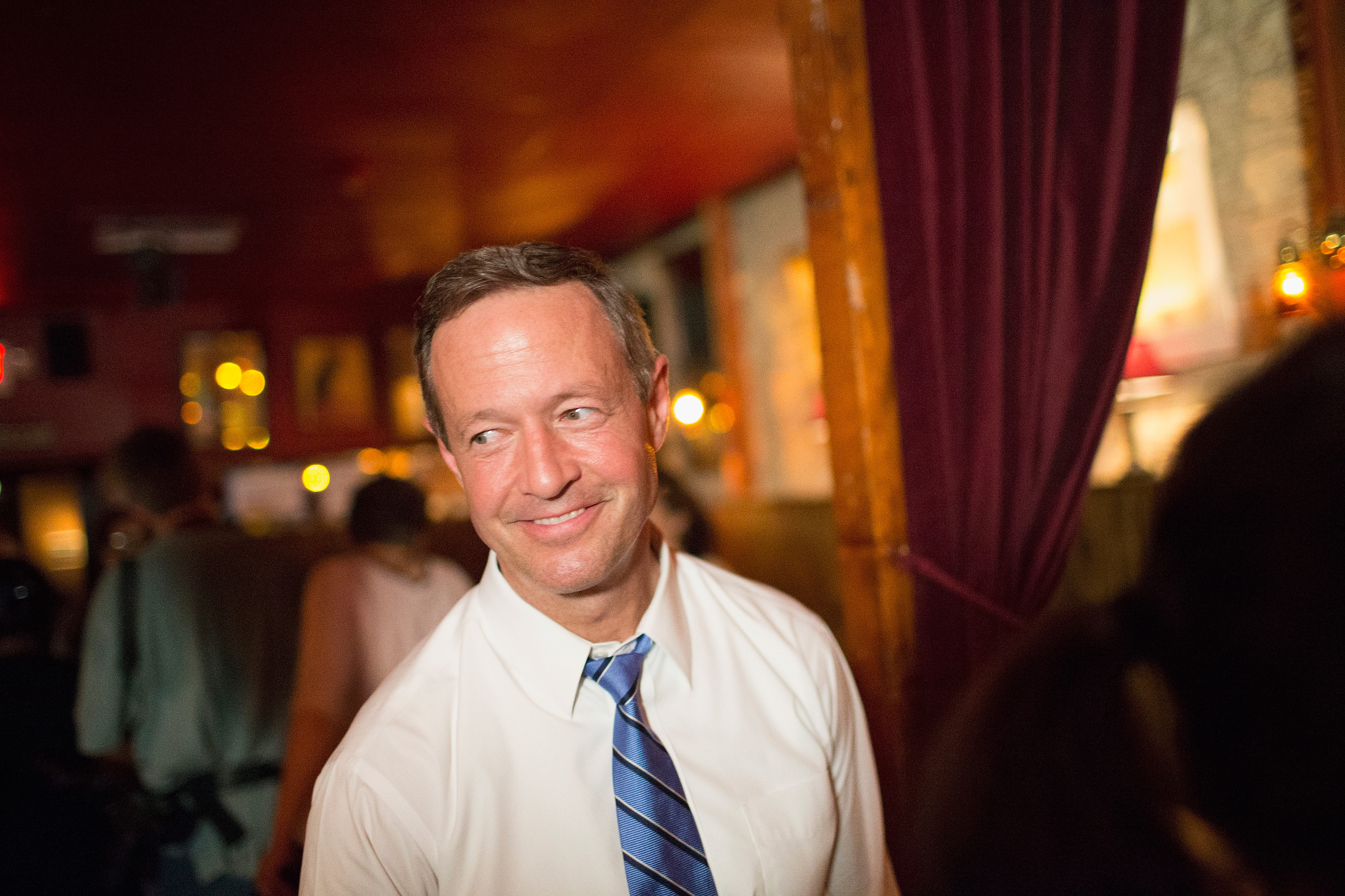 Democratic presidential hopeful and former Maryland Gov. Martin O'Malley speaks to guests during a campaign event at the Sanctuary Pub on June 11, 2015 in Iowa City, Iowa. (Scott Olson&mdash;Getty Images)