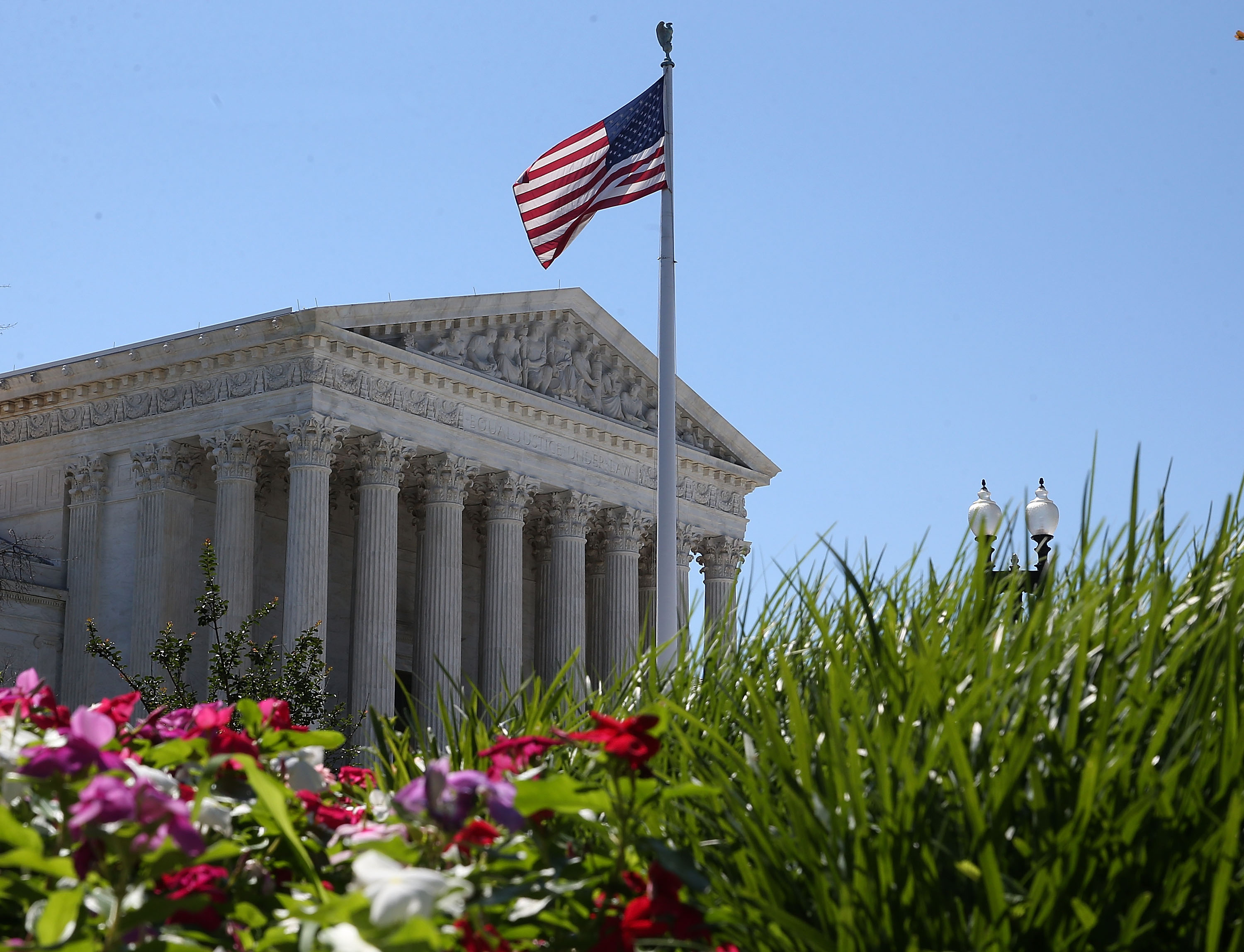 An American flag flies over the U.S. Supreme Court June 29, 2015 in Washington, DC.  ( Mark Wilson/Getty Images) (Mark Wilson&mdash;Getty Images)