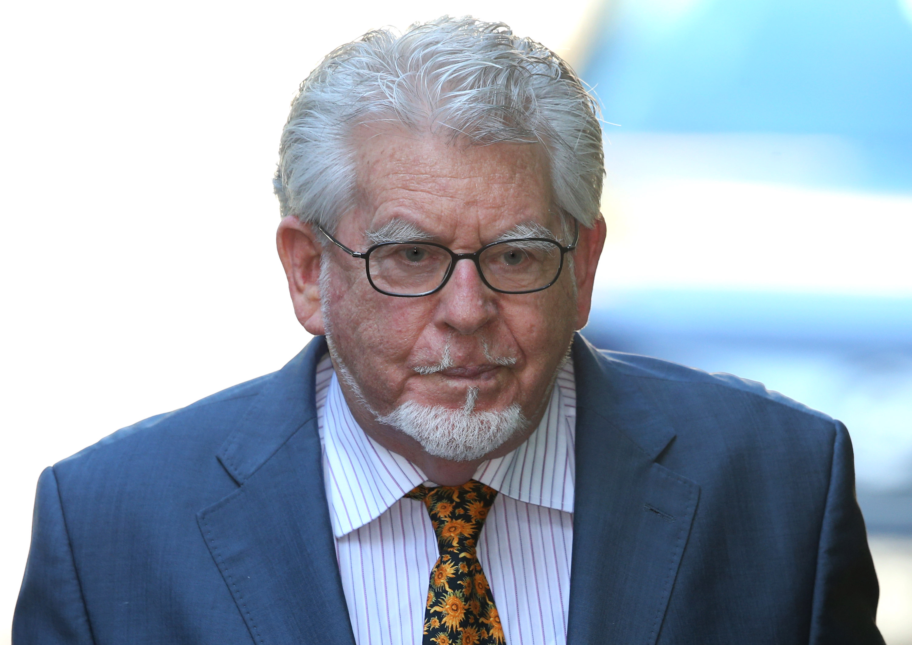 Artist and television personality Rolf Harris arrives at Southwark Crown Court in London on May 14, 2014 (Peter Macdiarmid—Getty Images)