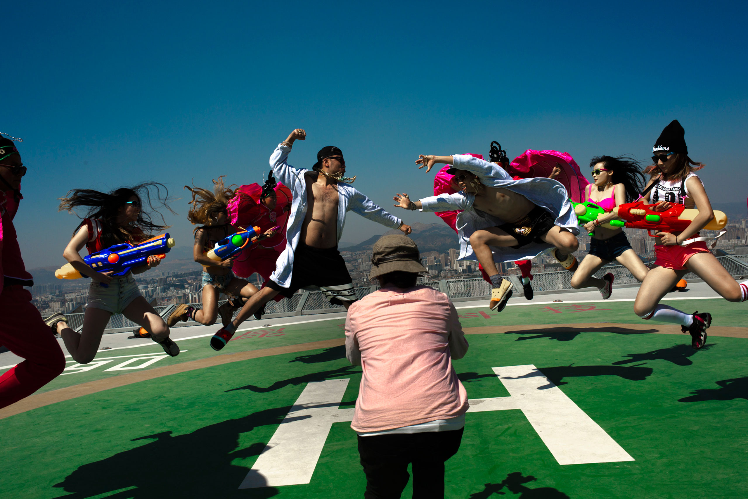 Dangsters, a hip-hop dance group based in Kunming, Yunnan Province, China, performs for a commercial video shoot, March 13, 2015.