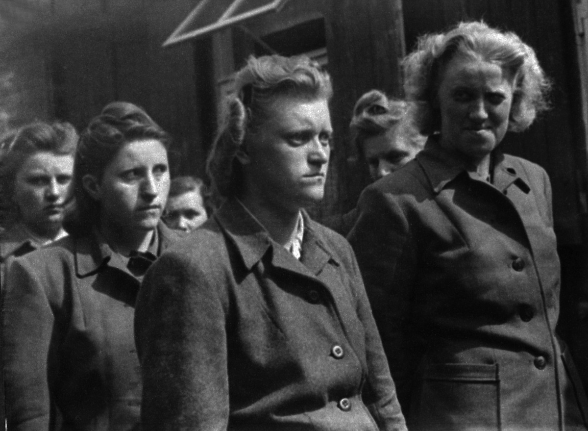 Women guards of the Bergen-Belsen Nazi concentration camp, including Herta Bothe (right) and Irma Grese (second right) are seen after capture by British troops who liberated the camp, April 1945. (AFP/Getty Images)