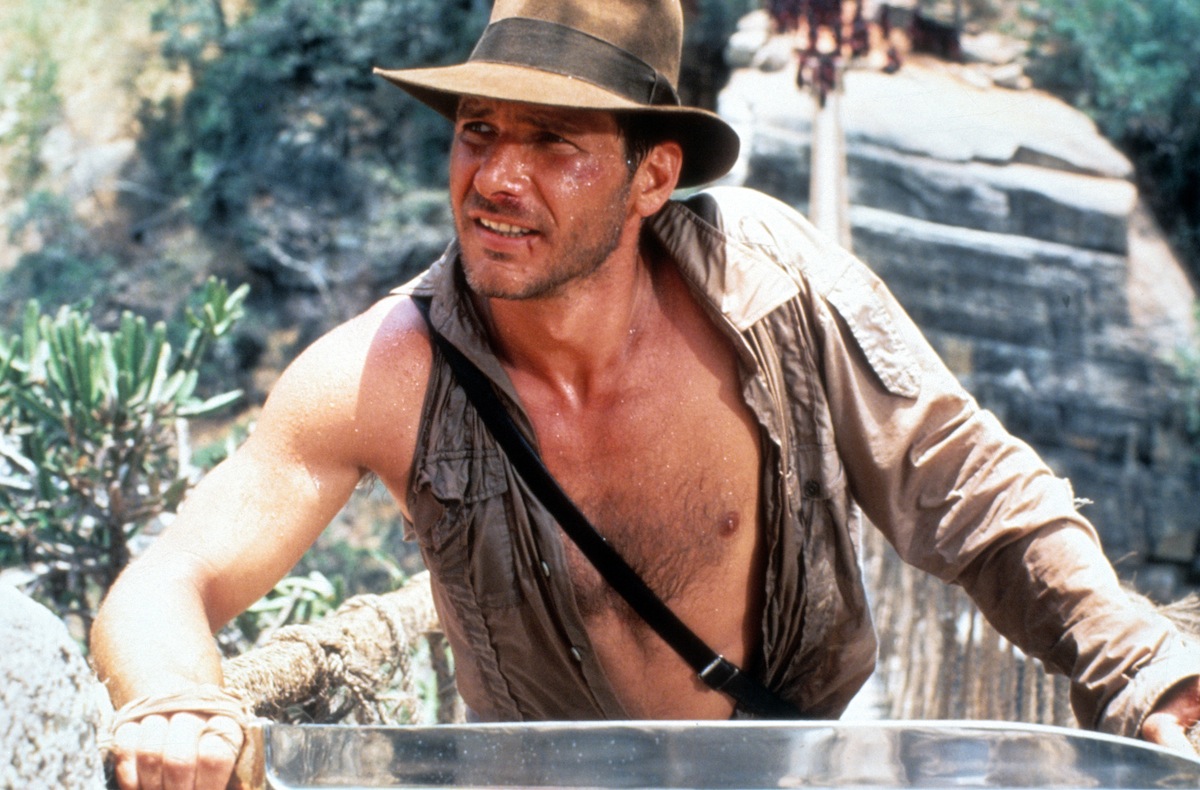Harrison Ford in a scene from the film 'Indiana Jones And The Temple Of Doom', 1984 (Paramount Pictures / Getty Images)