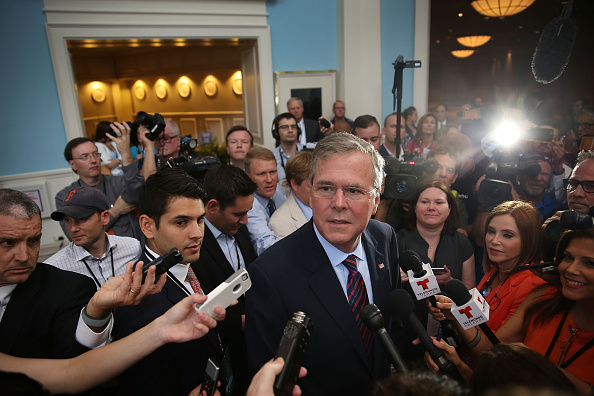Former Florida Governor Jeb Bush and possible Republican presidential candidate speaks to the media after addressing the Rick Scott's Economic Growth Summit held at the Disney's Yacht and Beach Club Convention Center on June 2, 2015 in Orlando, Florida.